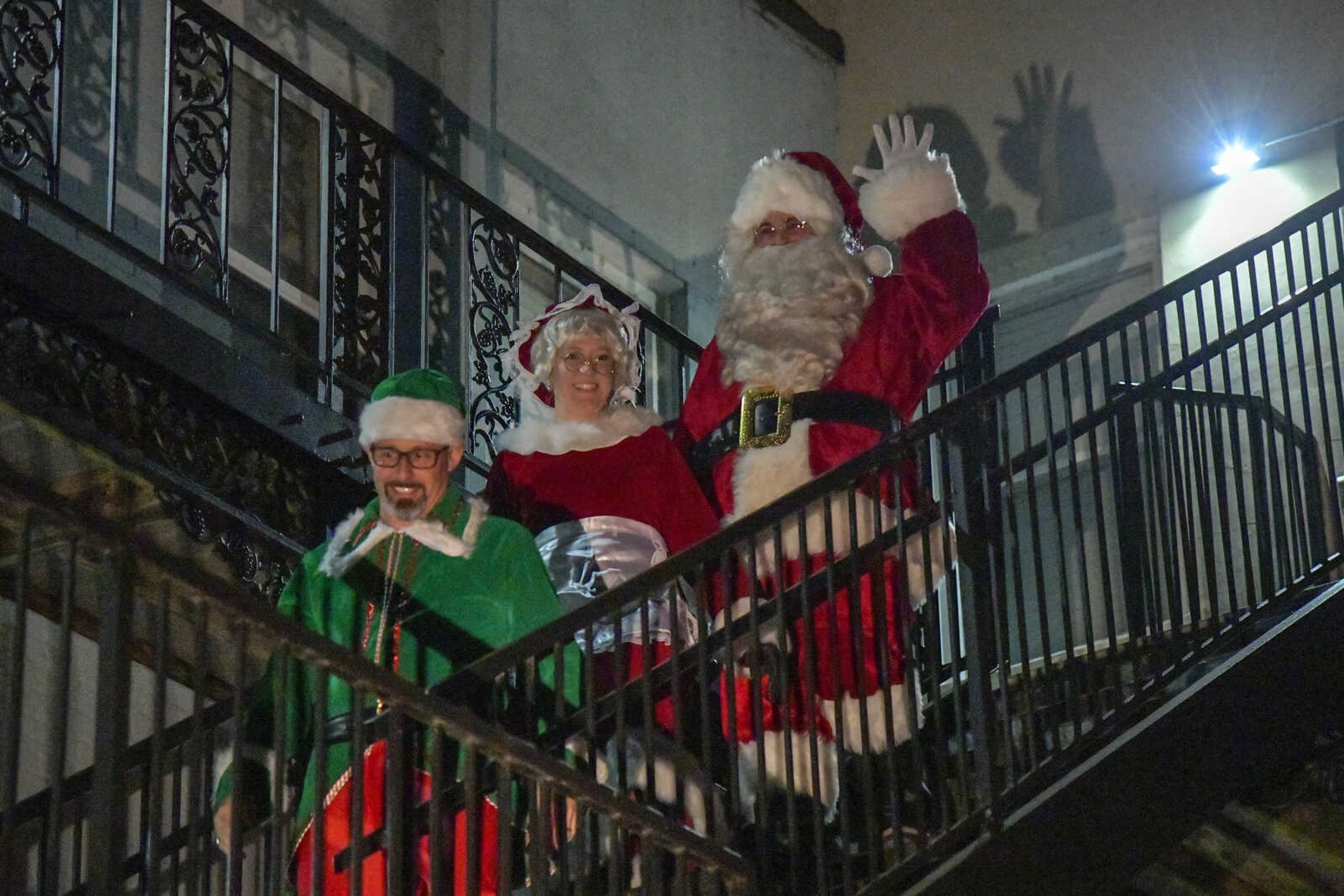 Santa Claus, Mrs. Claus and an elf arrive to the 3rd Annual Old Town Cape Christmas Tree Lighting on Friday in Cape Girardeau.