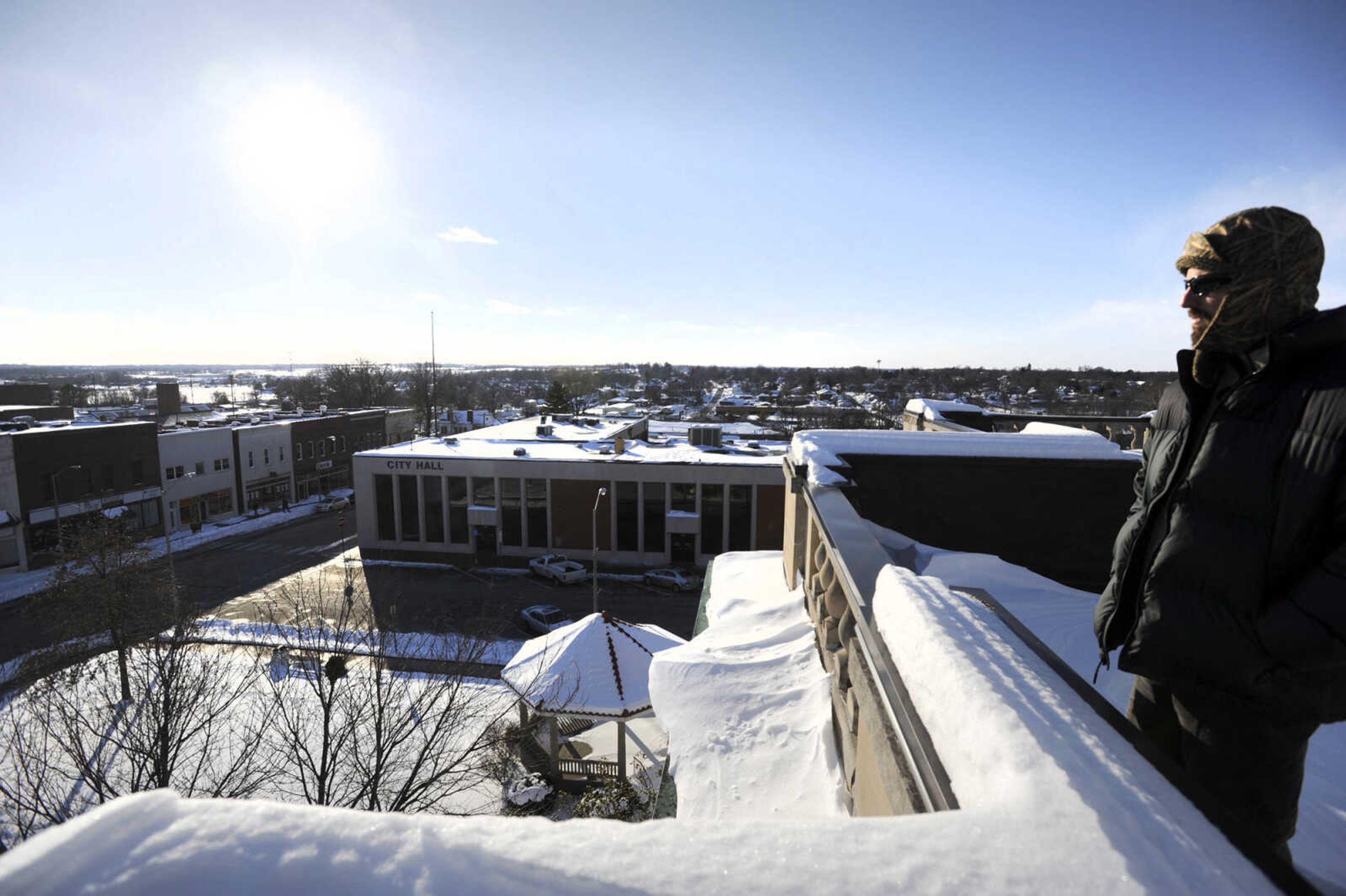 LAURA SIMON ~ lsimon@semissourian.com

Cape Girardeau County Recorder of Deeds, Andrew Blattner, looks out over Jackson from the roof of the Cape Girardeau County Courthouse, Wednesday, Feb. 18, 2015.