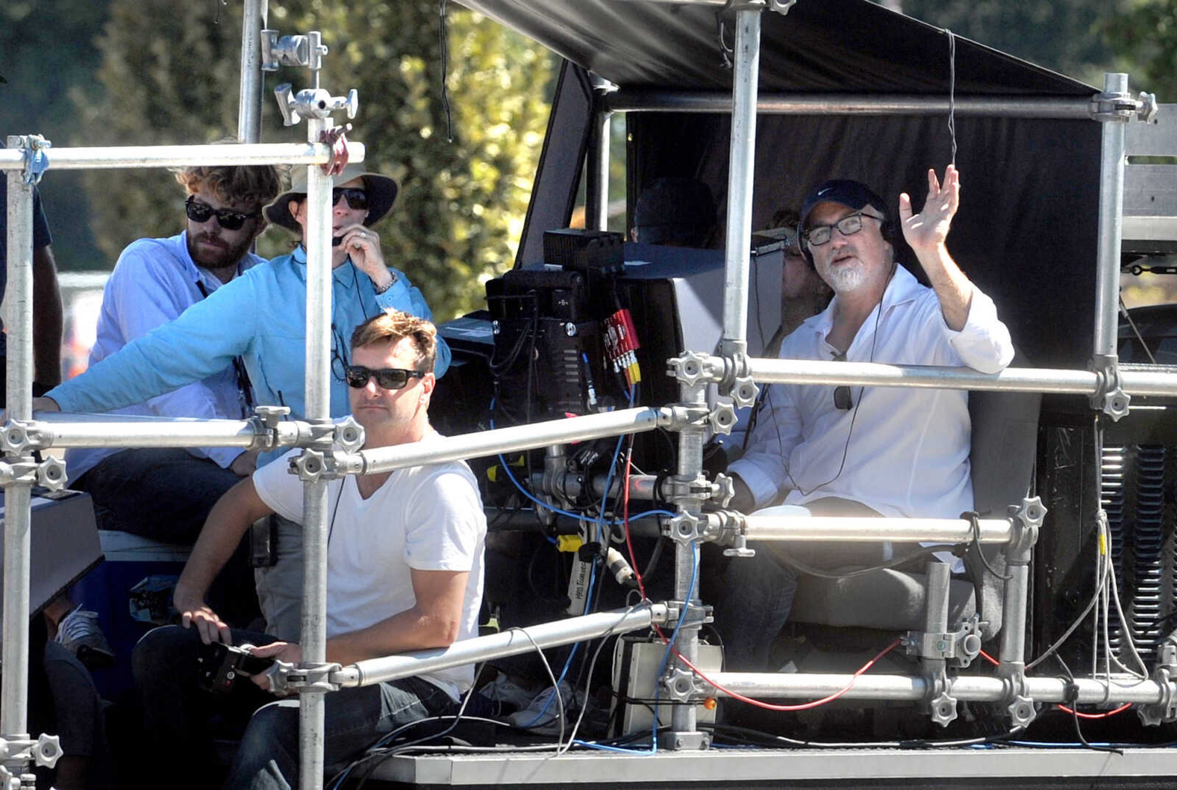 LAURA SIMON ~ lsimon@semissourian.com

A man believed to be director David Fincher waves to onlookers as production of 20th Century Fox's feature film "Gone Girl", gets underway near the Bill Emerson Memorial Bridge, Monday, Sept. 23, 2013, in Cape Girardeau.