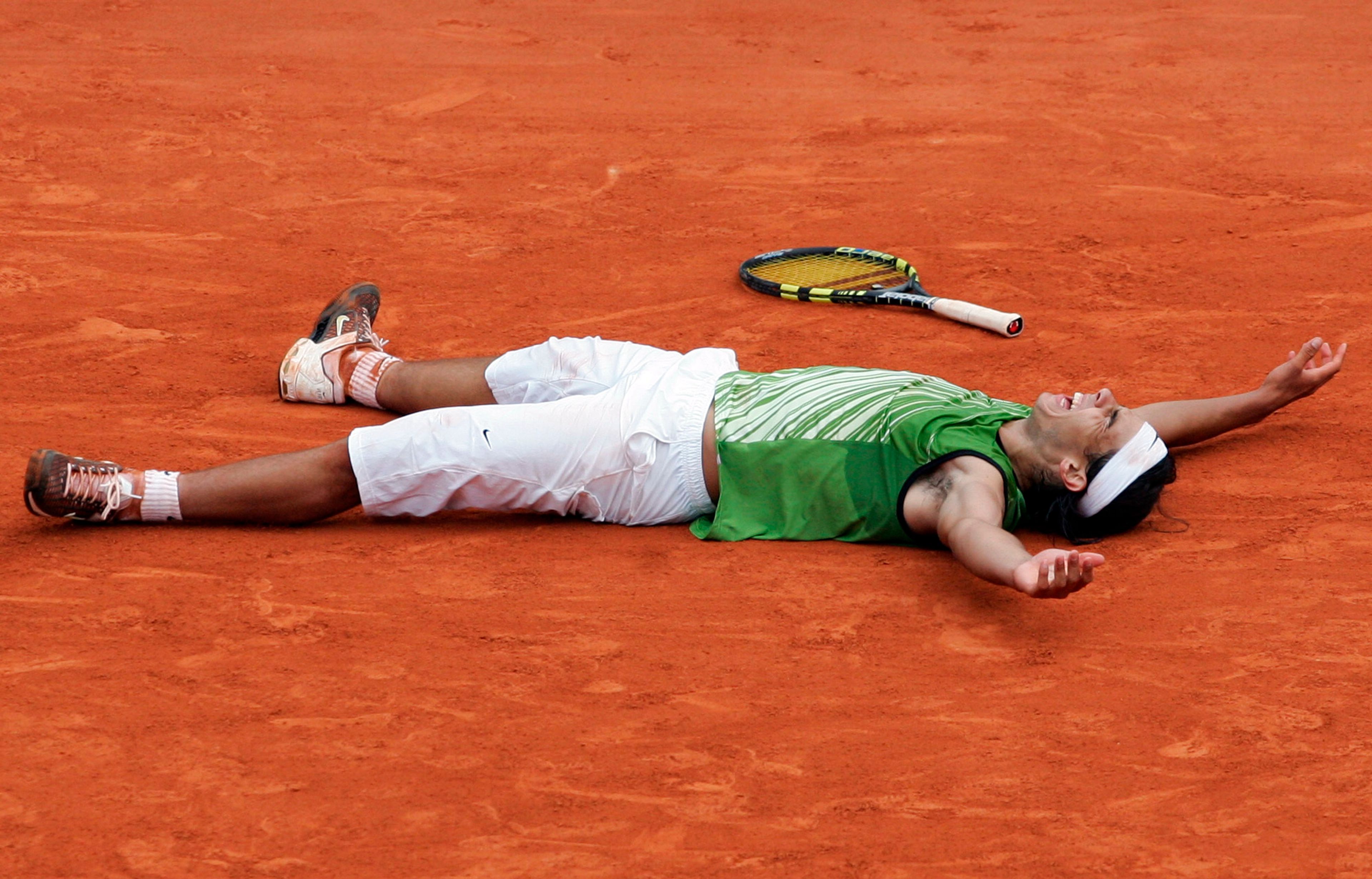 FILE - Spain's Rafael Nadal reacts as he defeats Argentina's Mariano Puerta during their final match of the French Open tennis tournament, at the Roland Garros stadium, Sunday June 5, 2005 in Paris. ( AP Photo/Christophe Ena, File)