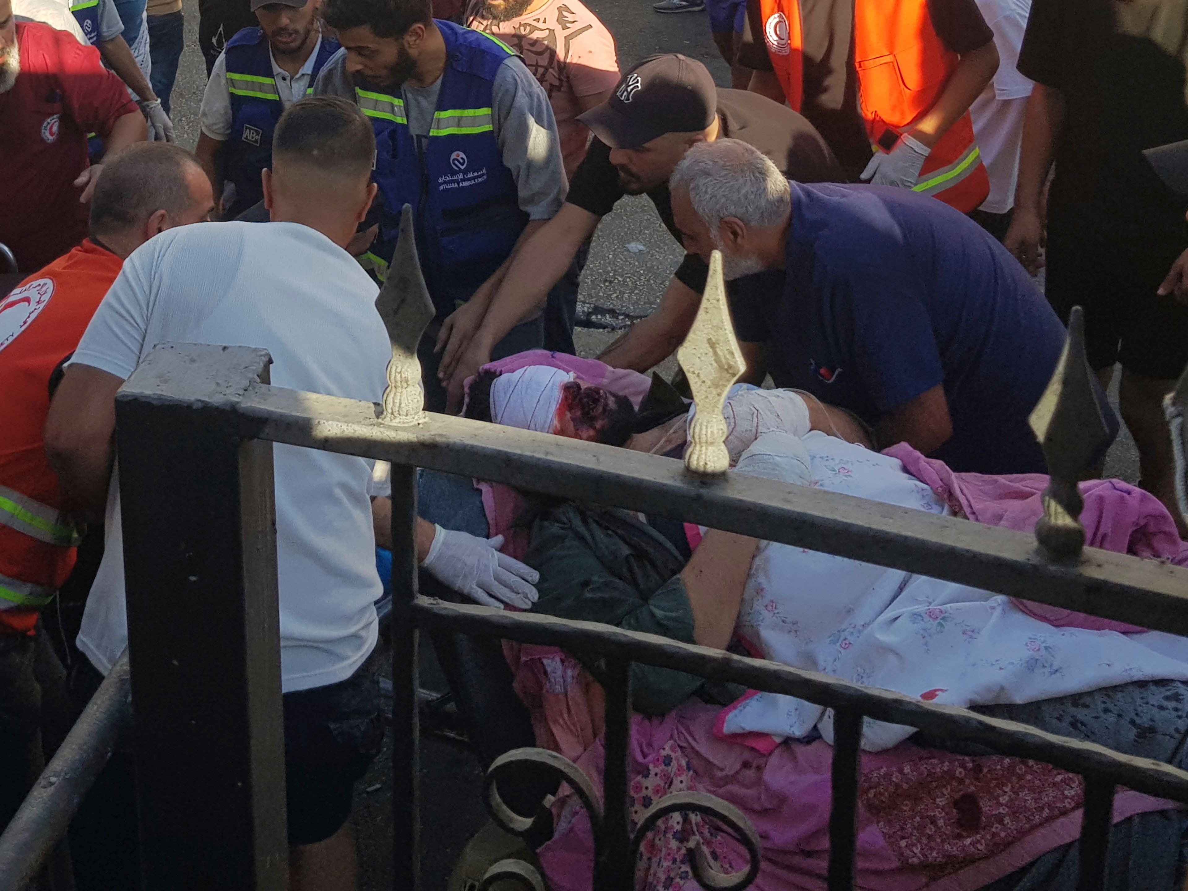 Civil Defense first-responders carry a man who was wounded after his handheld pager exploded, in the southern port city of Sidon, Lebanon, Tuesday, Sept. 17, 2024.(AP Photo)