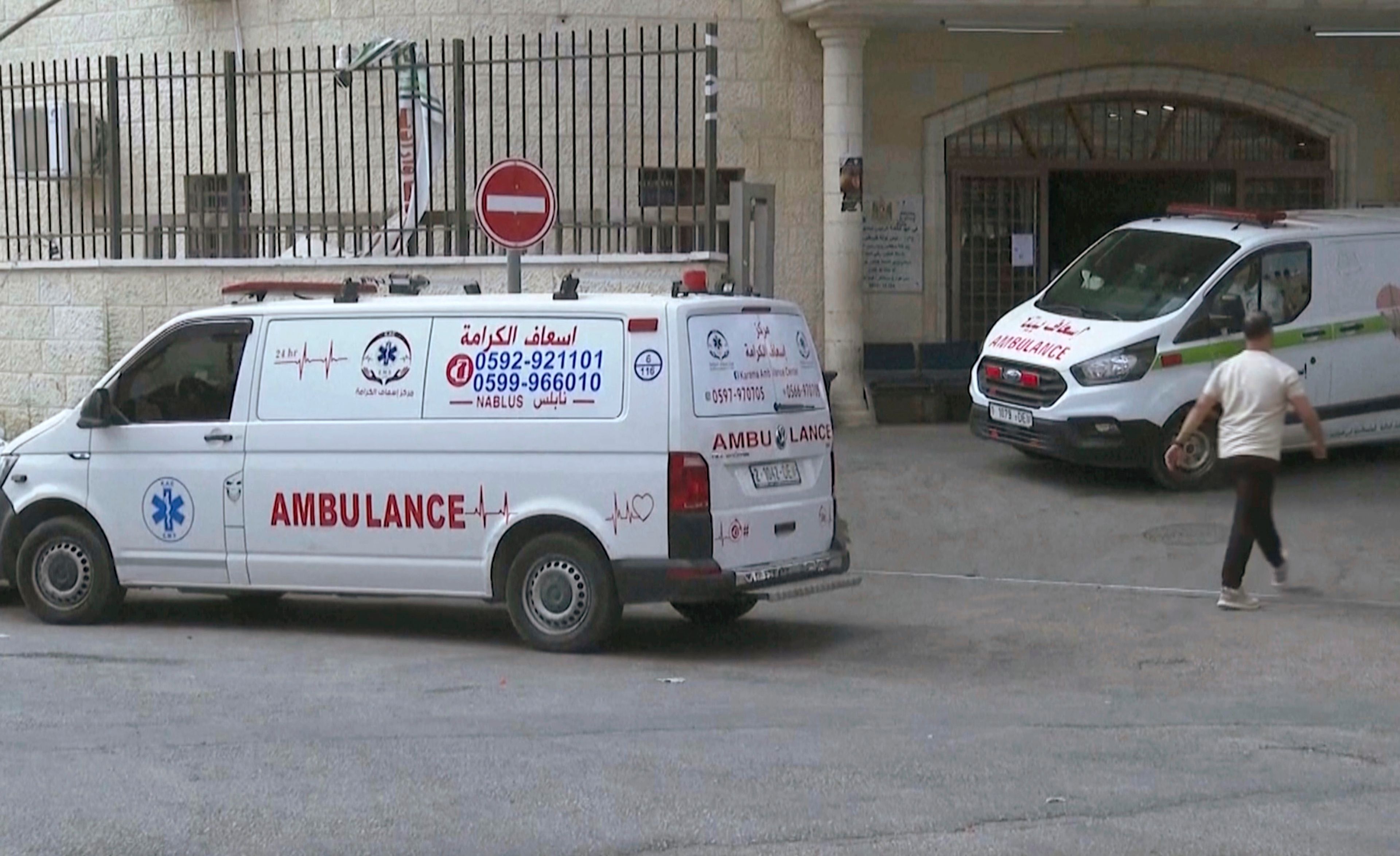 ADDS WITNESSES TO THE SHOOTING - This image taken from an Associated Press video shows Aysenur Ezgi Eygi's body being transported through the Rafidia Surgical Hospital, where she was taken after after witnesses say she was fatally shot by Israeli soldiers, Sept. 6, 2024, in the West Bank city of Nablus. (AP Photo/Aref Tufaha)