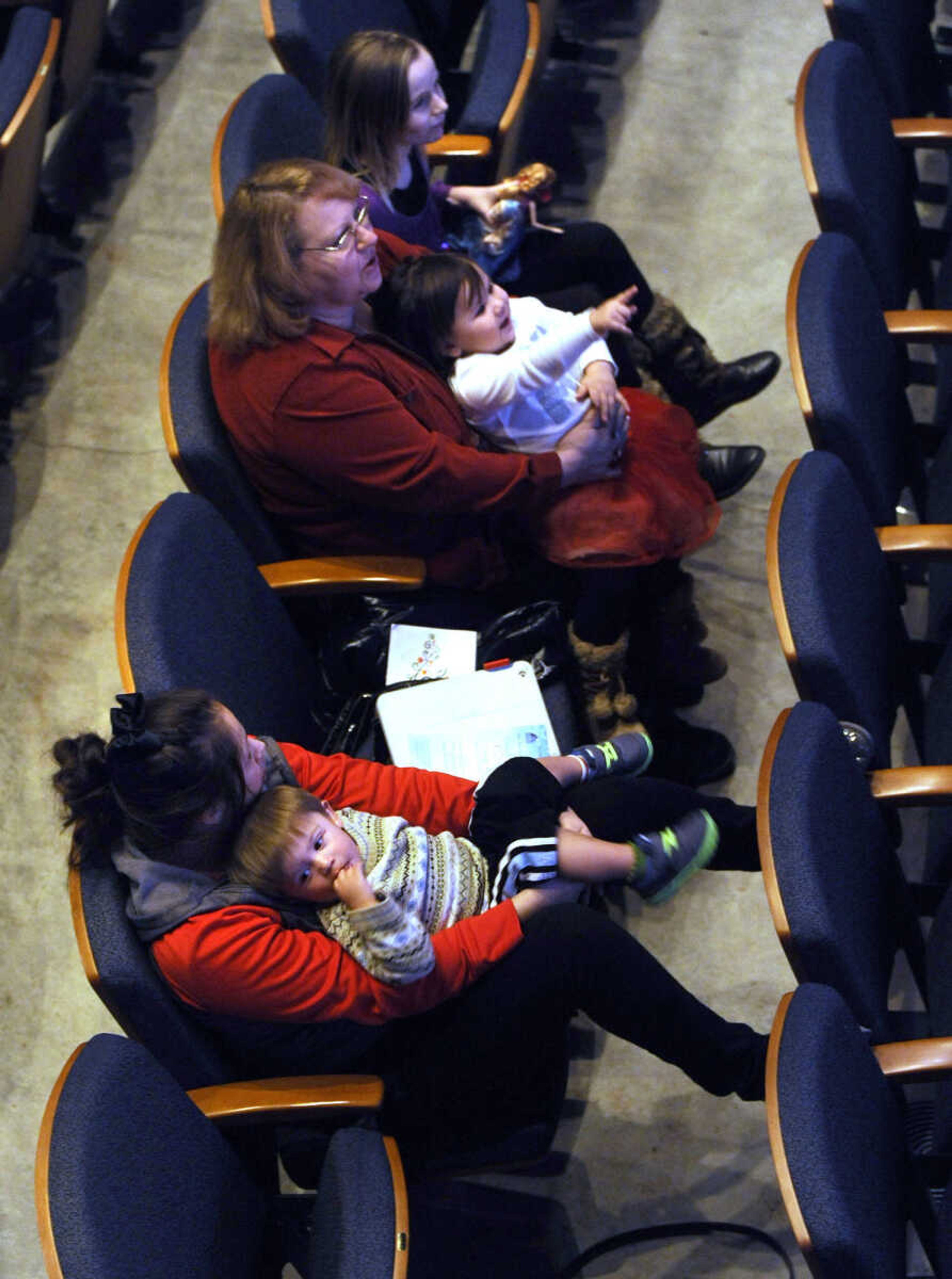 FRED LYNCH ~ flynch@semissourian.com
Families listen to the Southeast Missouri State University percussion ensemble Saturday, Dec. 13, 2014 at Bedell Performance Hall on the River Campus.