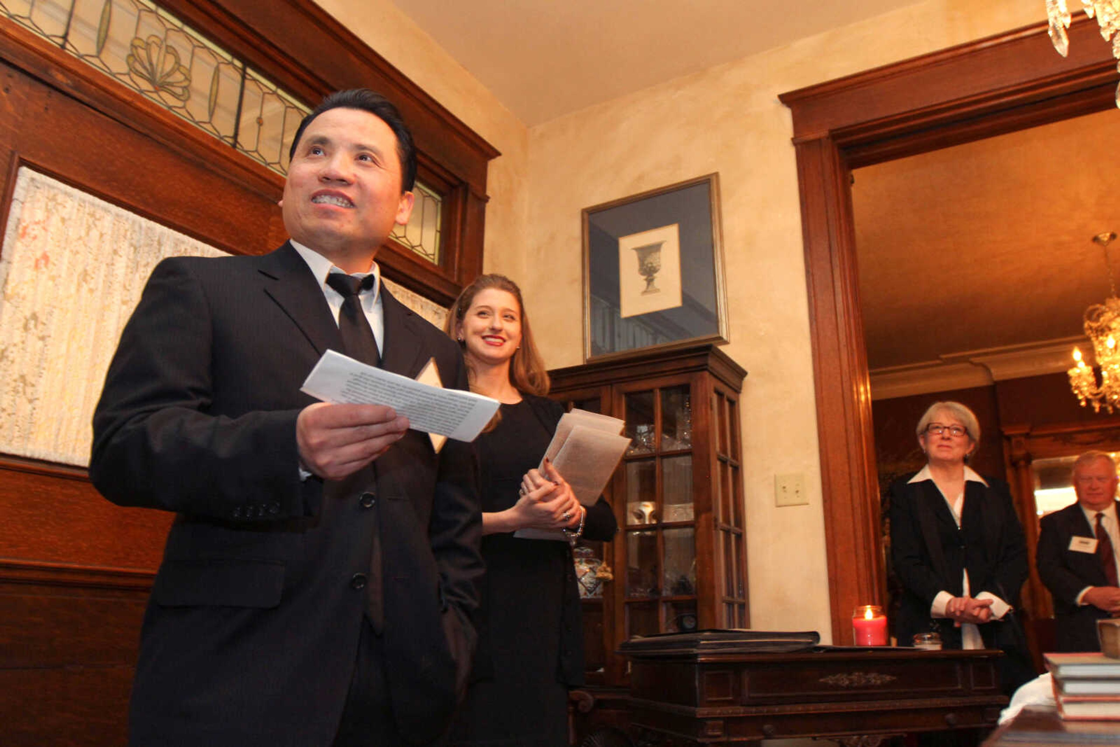 GLENN LANDBERG ~ glandberg@semissourian.com

Peter Nguyen and Murielle Gaither with the Arts Council of Southeast Missouri present the awards during the second annual Dingeldein Gala at the Oliver-Leming House Friday, Jan. 16, 2014.