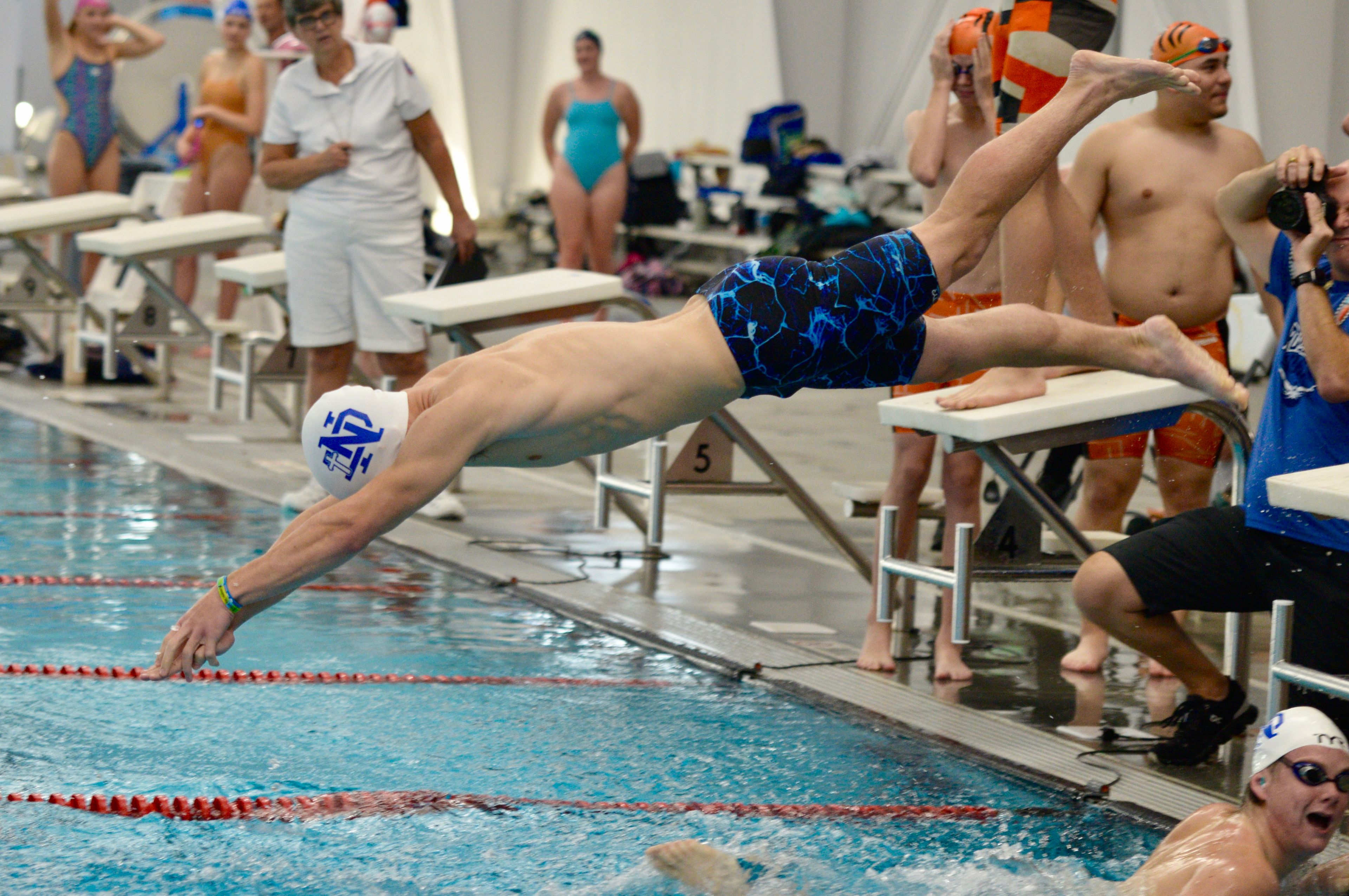 Notre Dame’s Parker Hulshof dives during a relay against Cape Central on Tuesday, Oct. 29, at the Cape Aquatic Center.