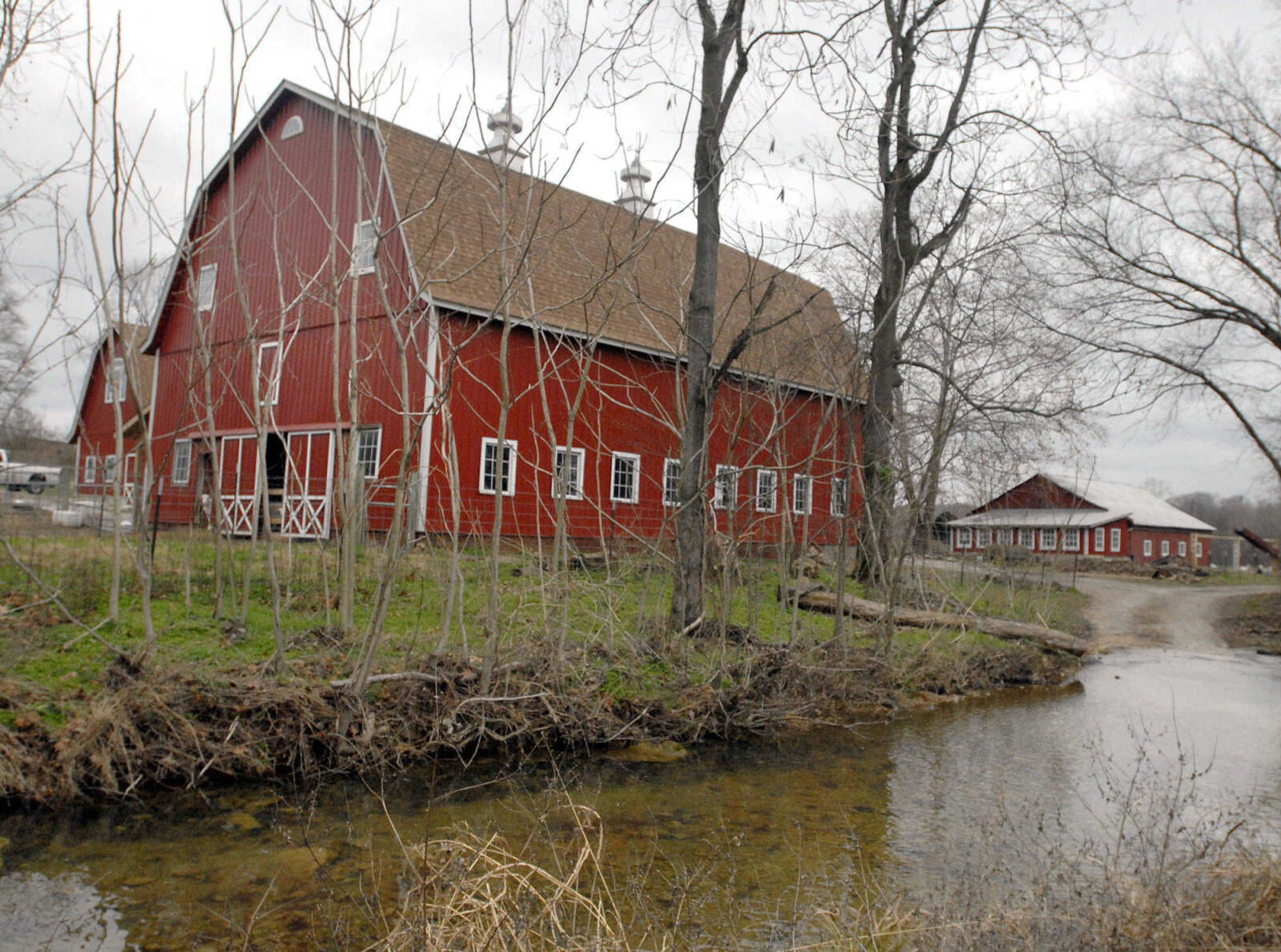 LAURA SIMON ~ lsimon@semissourian.com
Red barns fill the landscape Wednesday, Dec. 14, 2011 at Baetje Farms in Bloomsdale, Mo.