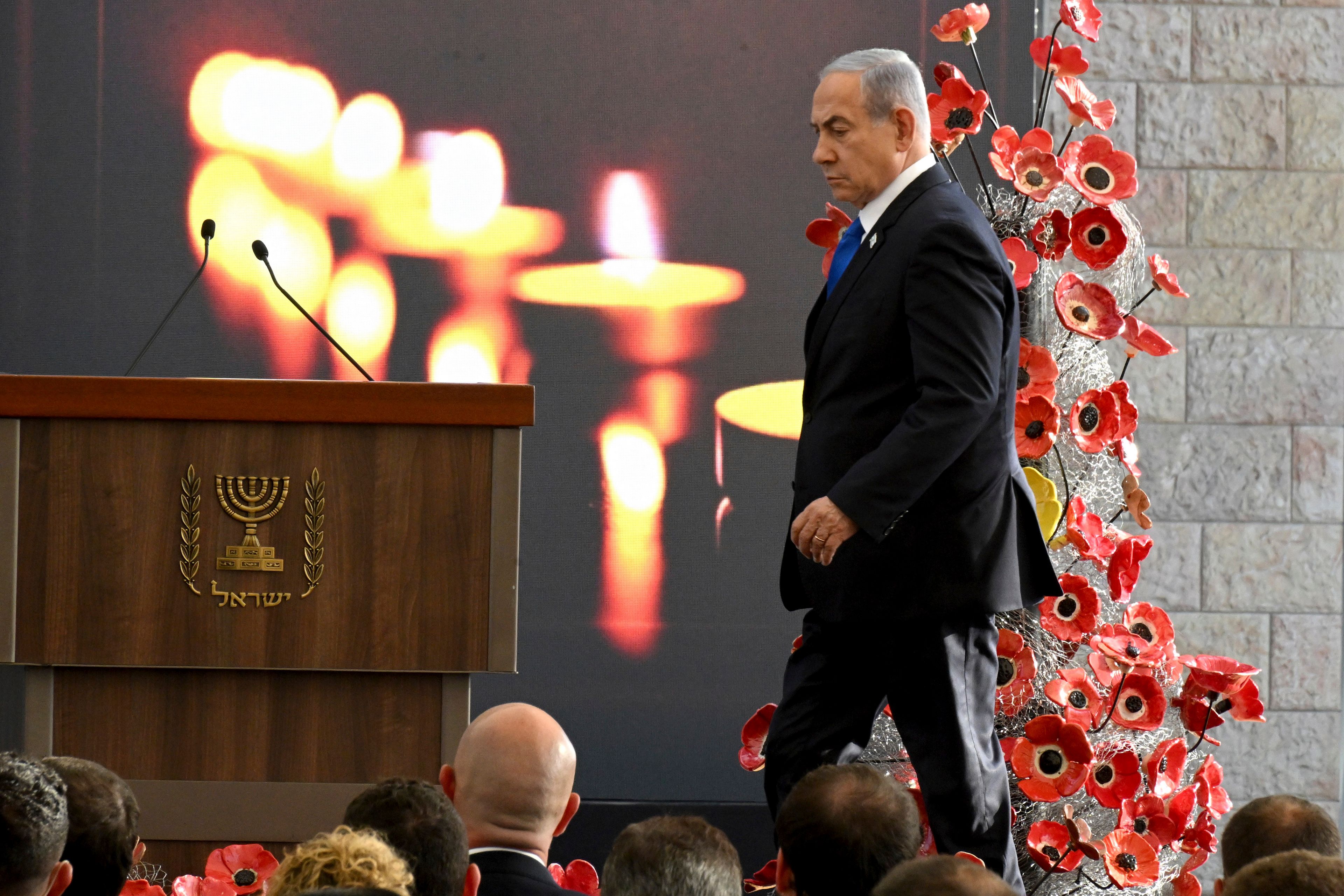 Israeli Prime Minister Benjamin Netanyahu arrives for a memorial ceremony for those killed by Hamas on Oct. 7, 2023, and those who fell in the "Iron Sword" war, at the Knesset, the Parliament, in Jerusalem, Monday, Oct. 28, 2024. (Debbie Hill, Pool Photo via AP)