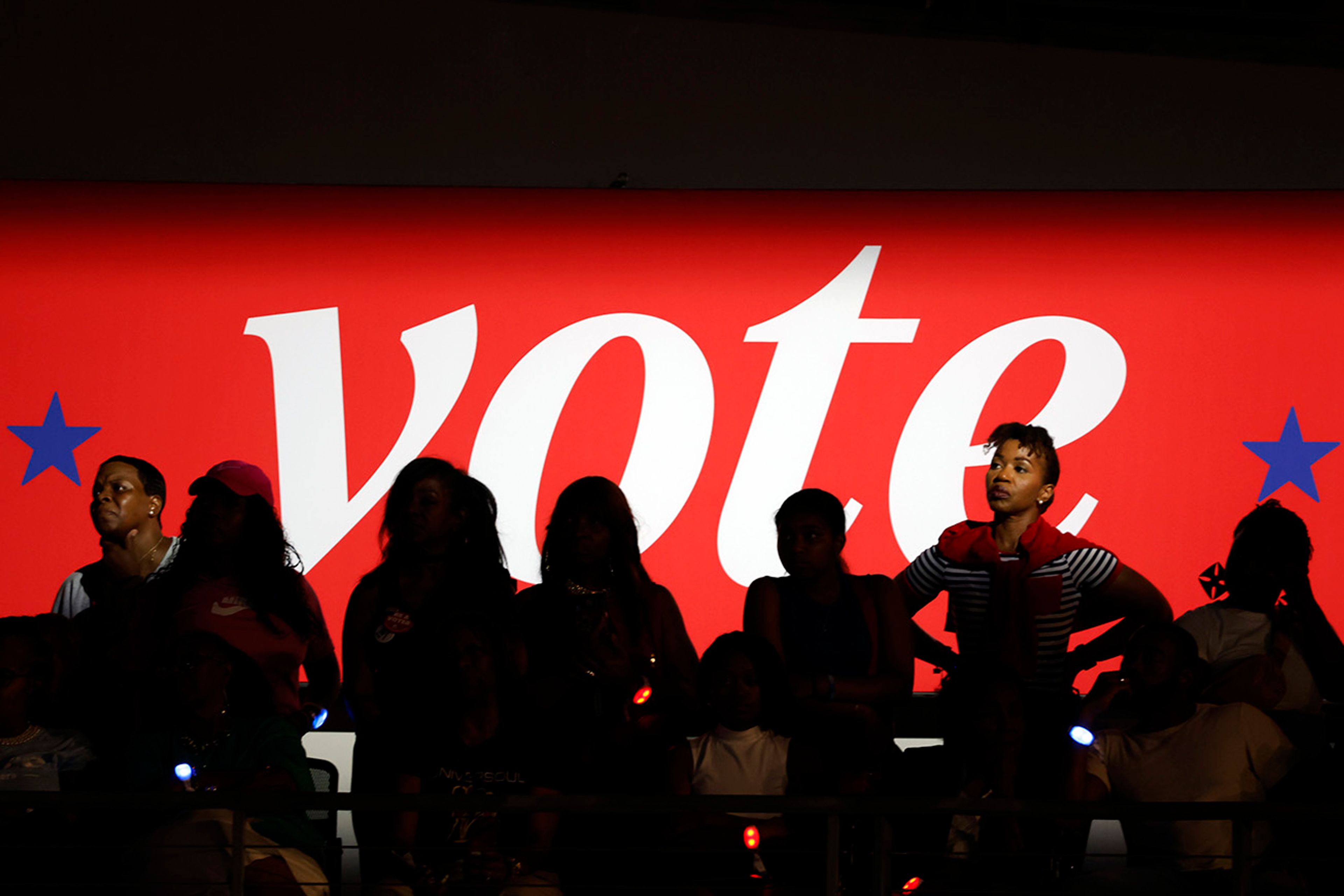 Attendees look on at a campaign rally for Democratic presidential nominee Vice President Kamala Harris, Friday, Oct. 25, 2024, in Houston.