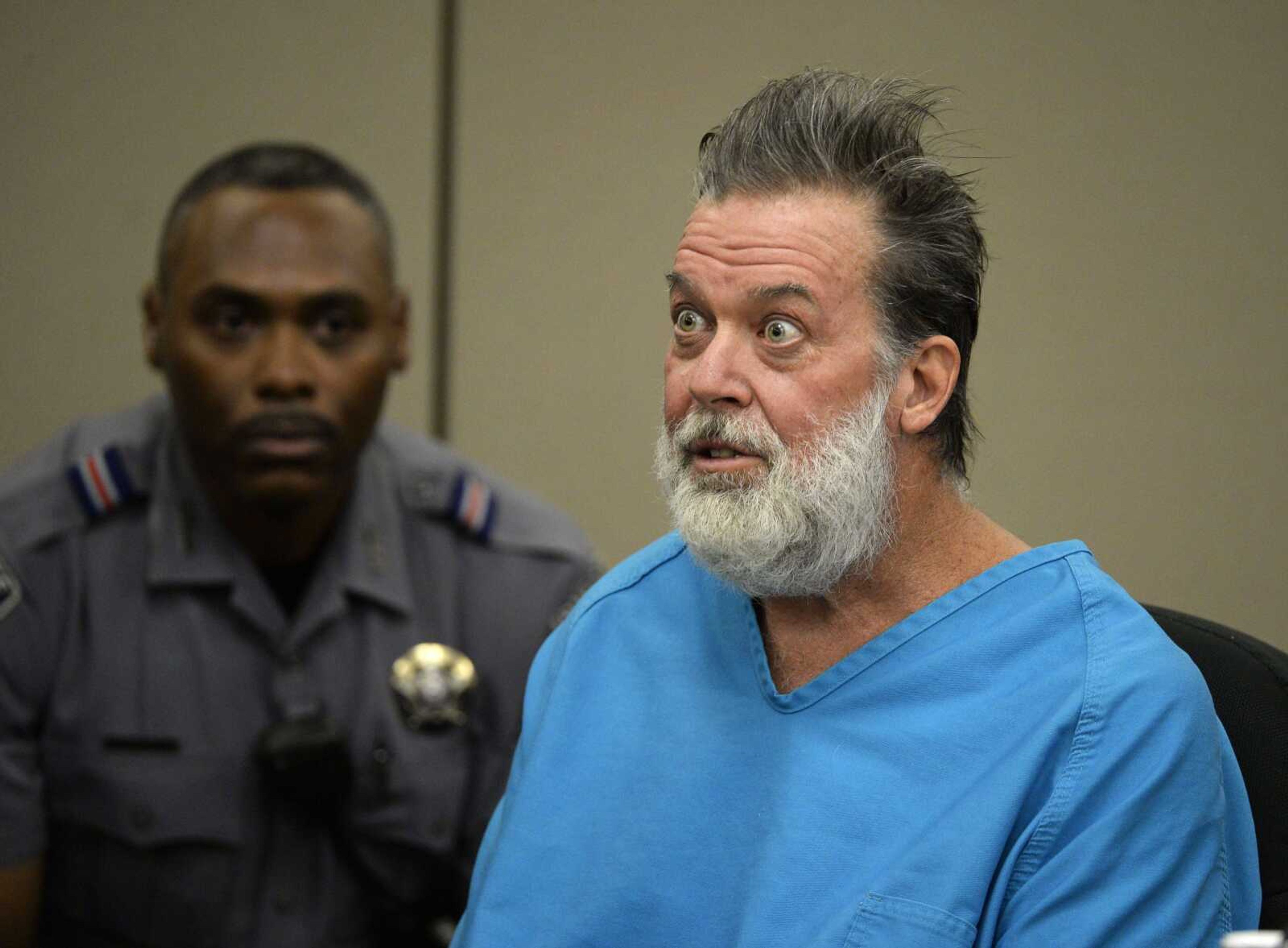 Robert Lewis Dear talks to Judge Gilbert Martinez during a court appearance on Wednesday in Colorado Springs, Colorado. Dear is accused of killing three people and wounding nine others at a Colorado Springs Planned Parenthood clinic on Nov. 27. (Andy Cross ~ The Denver Post via AP)