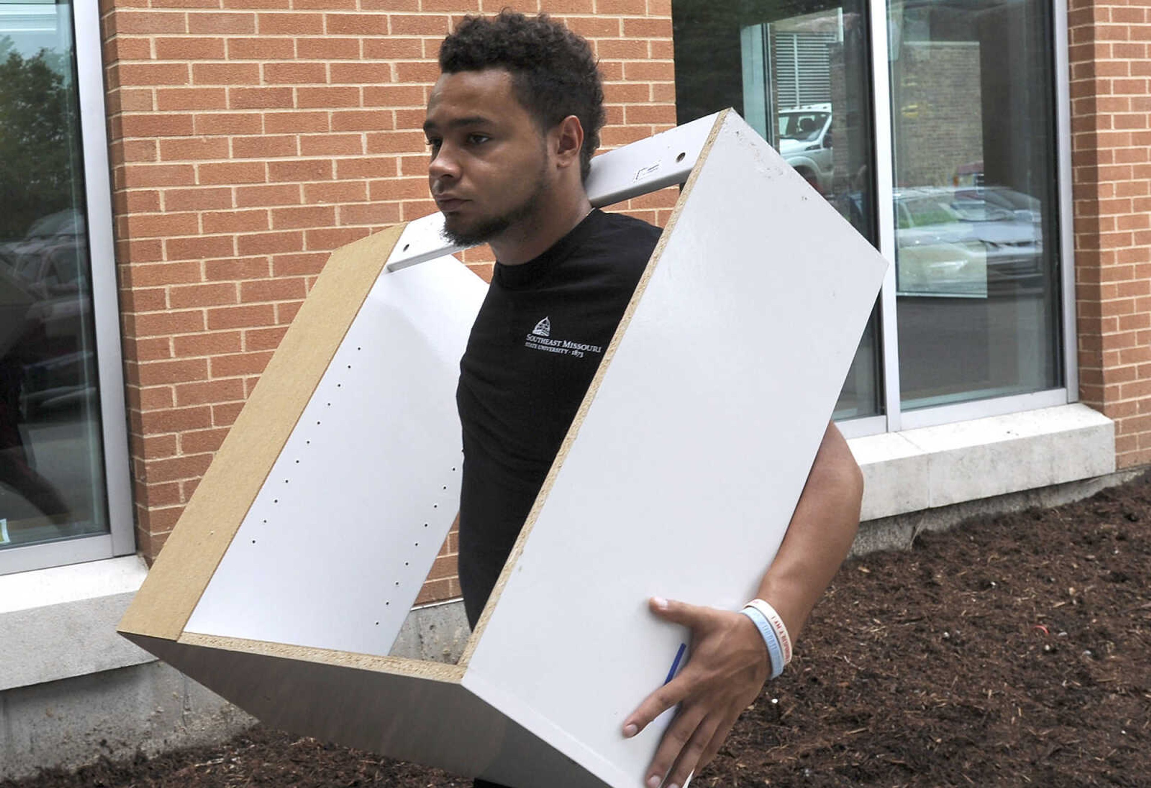 Southeast Missouri State University students move in Thursday, Aug. 18, 2016 at Towers Complex.