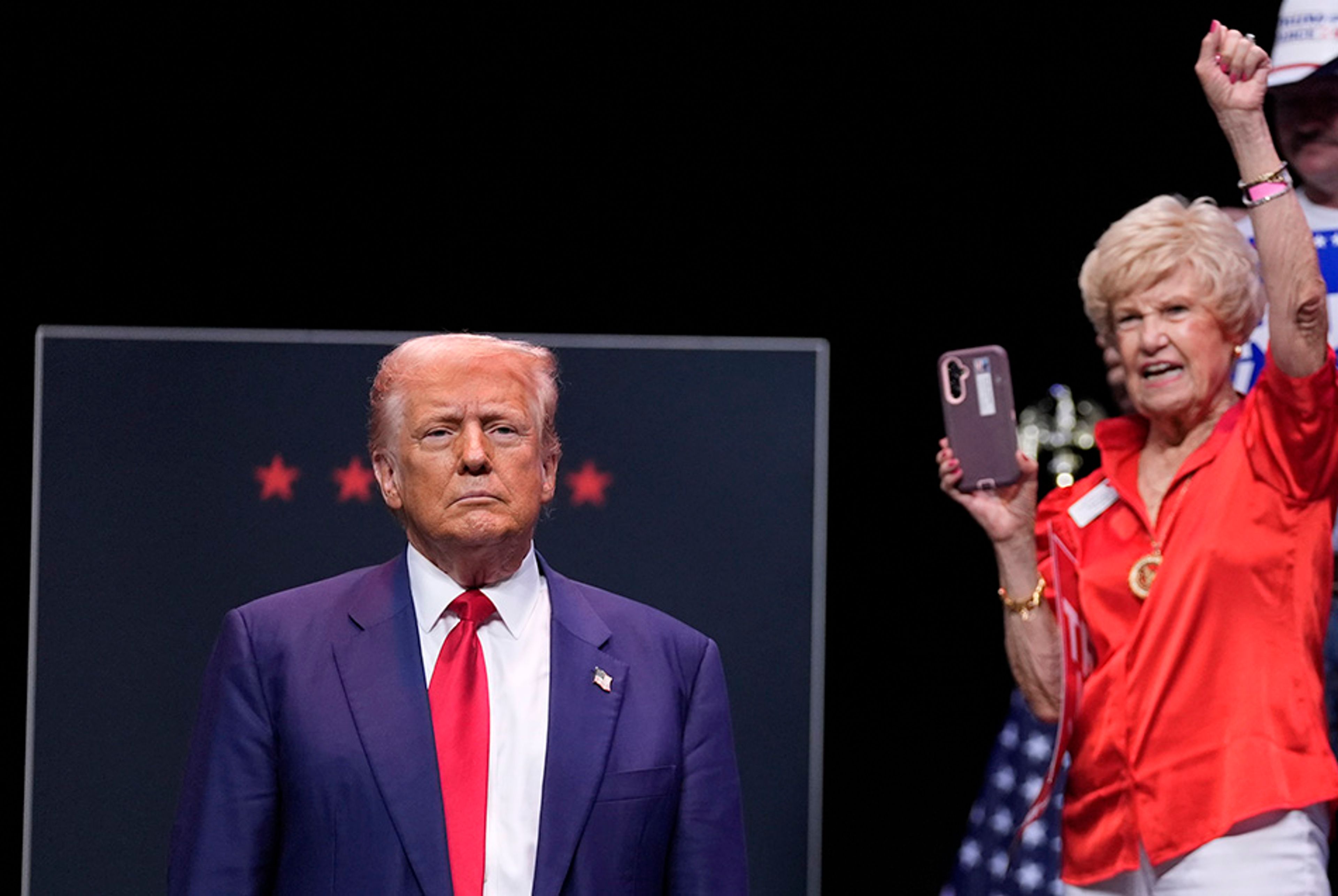 Republican presidential nominee former President Donald Trump arrives to speak about the tax code and manufacturing at the Johnny Mercer Theatre Civic Center, Tuesday, Sept. 24, 2024, in Savannah, Ga. 