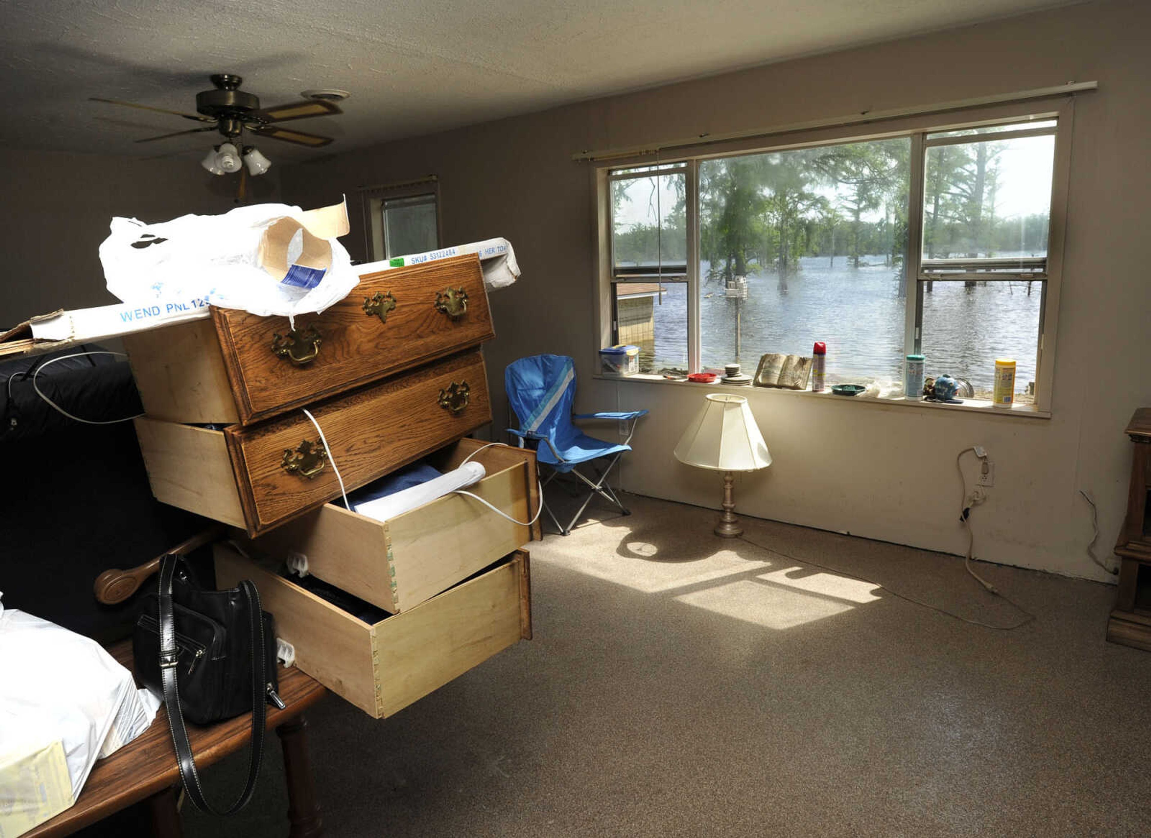 FRED LYNCH ~ flynch@semissourian.com
The living room in the Dunn house next to Horseshoe Lake is drying out Thursday, May 12, 2011.