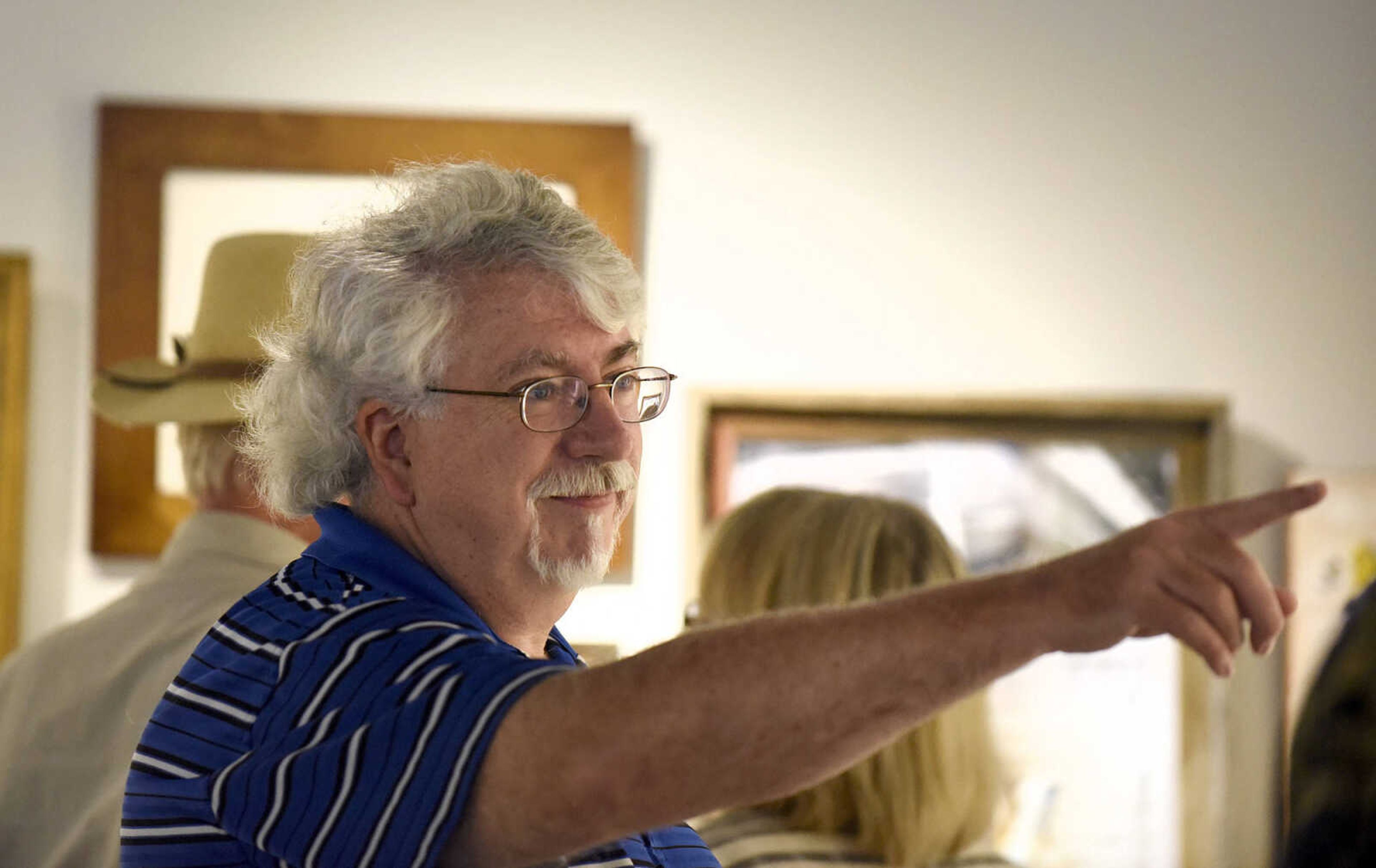 LAURA SIMON ~ lsimon@semissourian.com

People take in the grand opening reception for the 4th annual Members Exhibit at the Arts Council of Southeast Missouri in its new location at 16 North Spanish Street in downtown Cape Girardeau on Friday, Sept. 2, 2016.