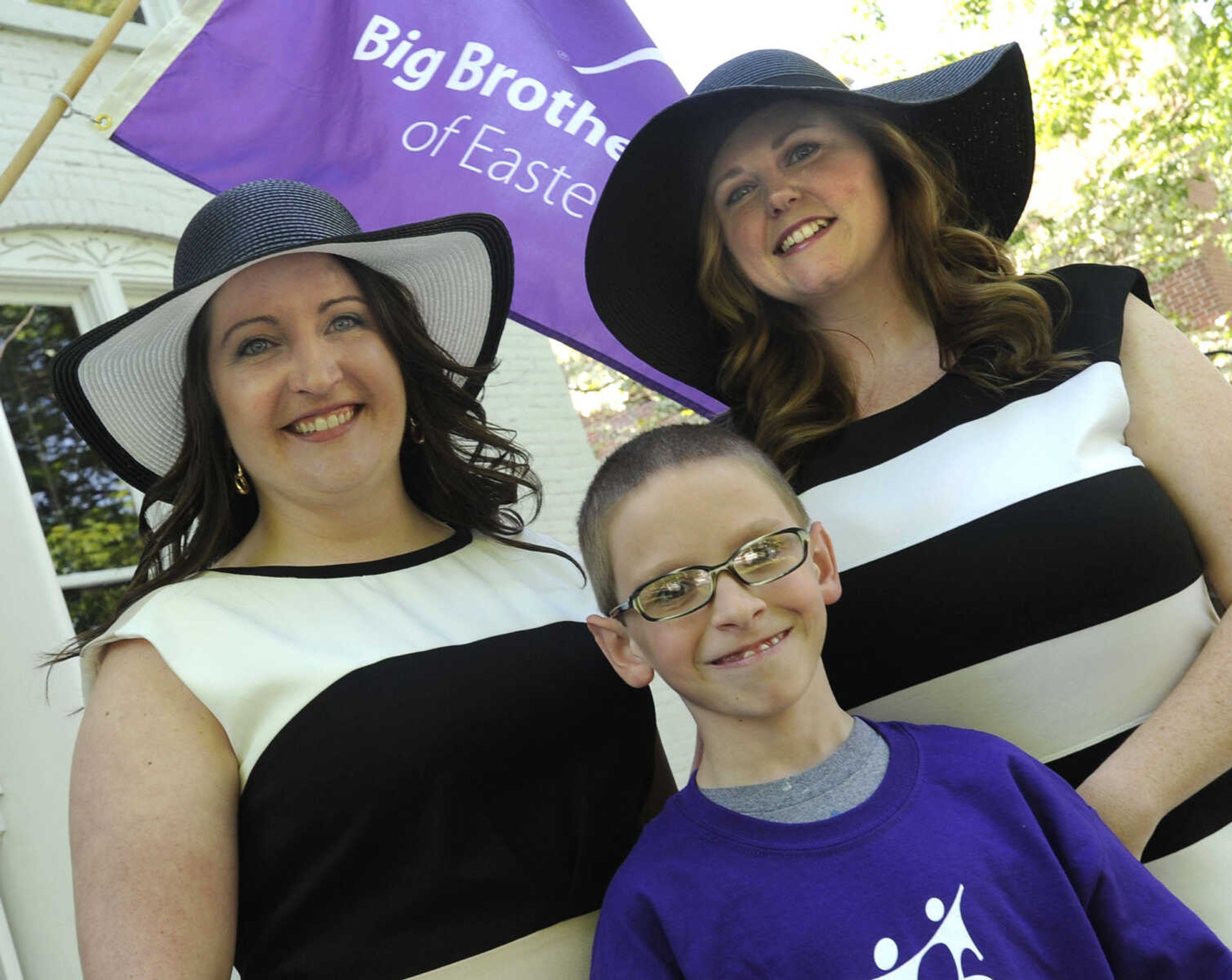 Bethany Beggs, left, James Copen and Becky Simpher pose for a photo at the Derby Party fundraiser for Big Brothers Big Sisters of Eastern Missouri on Saturday, May 3, 2014 at the Glenn House in Cape Girardeau.