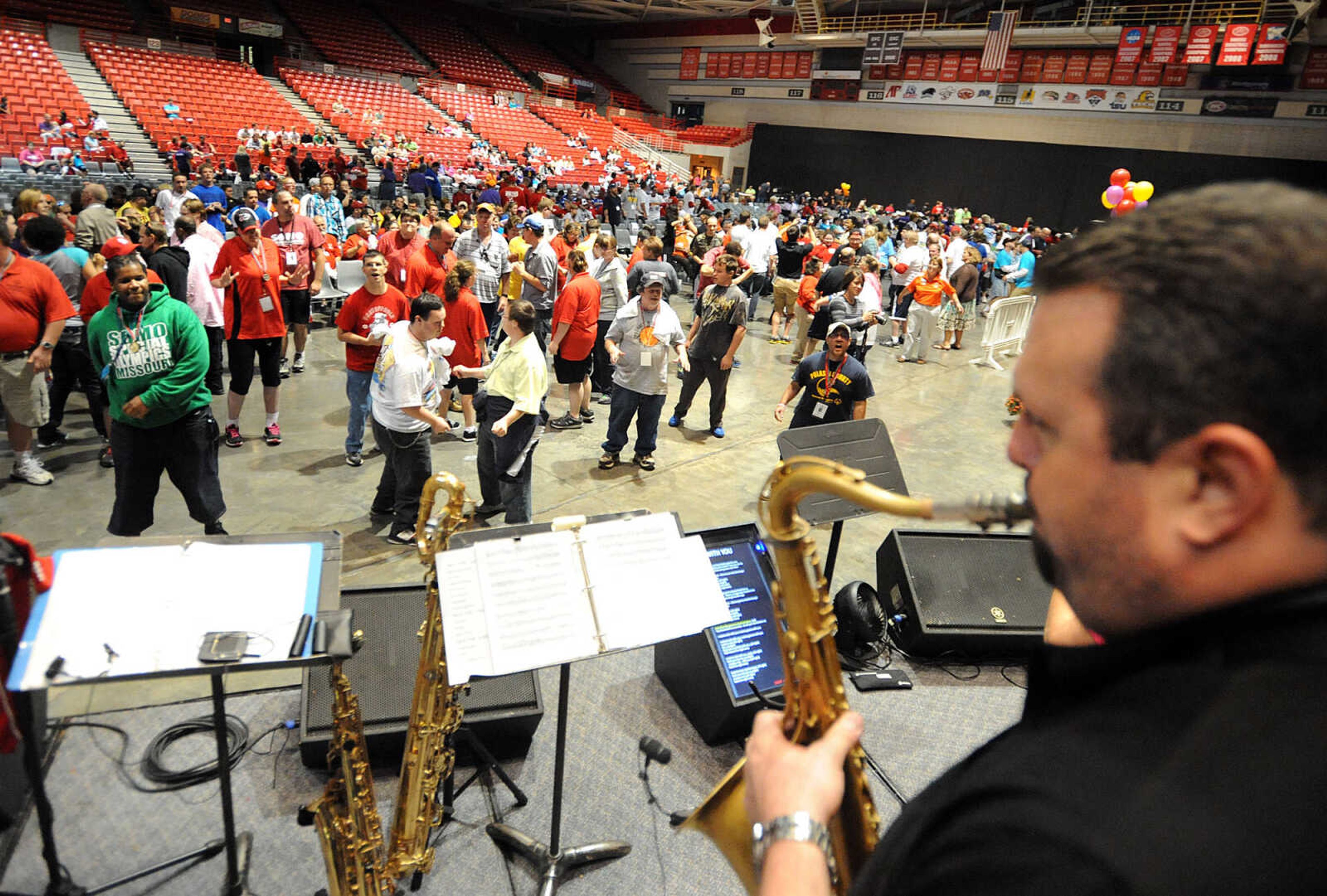 LAURA SIMON ~ lsimon@semissourian.com

Special Olympic athletes dance to music from Shades of Soul, Friday, Oct. 11, 2013 during the opening ceremony for the Special Olympics Missouri State Fall Games at the Show Me Center.