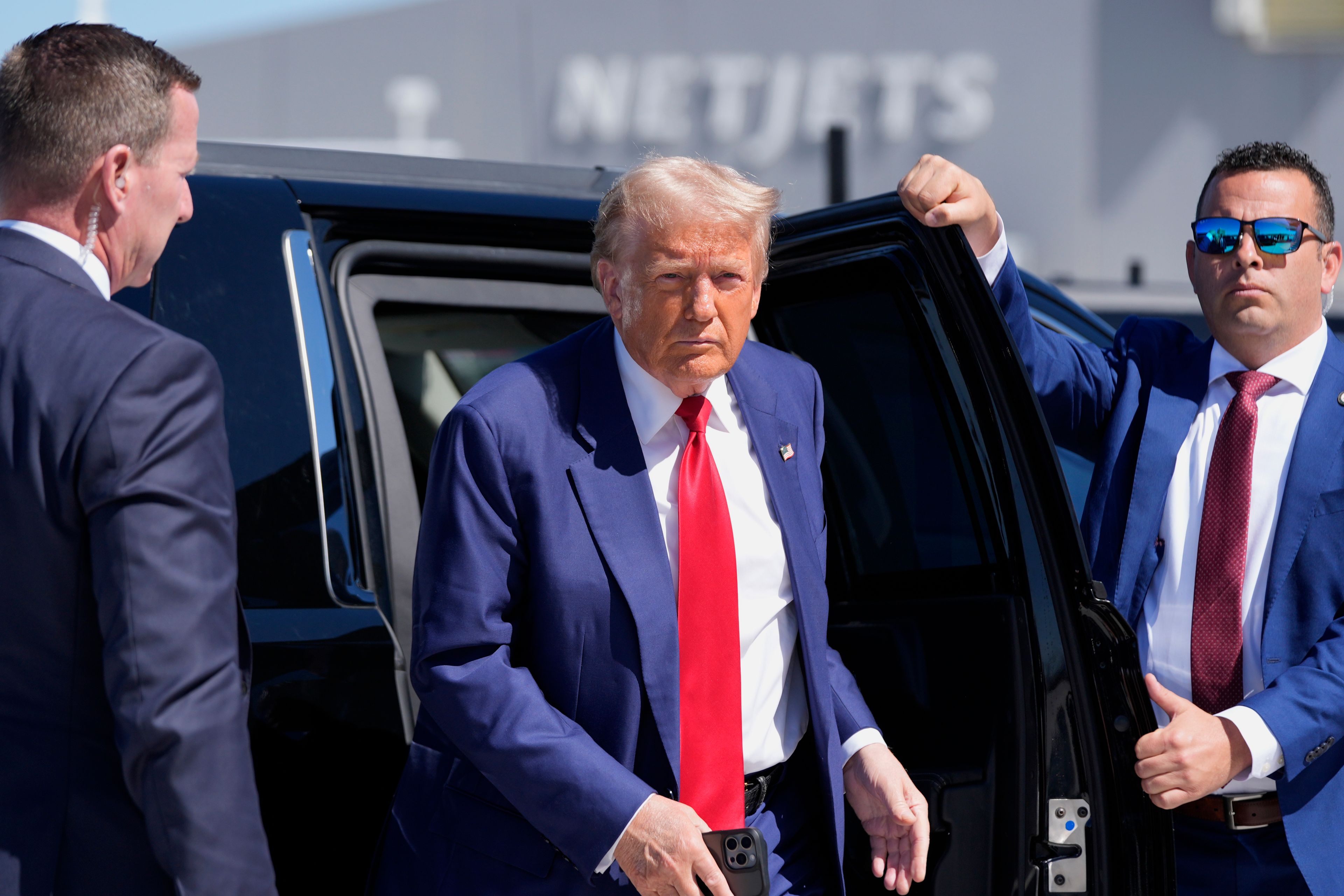 Republican presidential nominee former President Donald Trump arrives at Harry Reid International Airport to board a plane after a campaign trip, Saturday, Sept.14, 2024, in Las Vegas. (AP Photo/Alex Brandon)