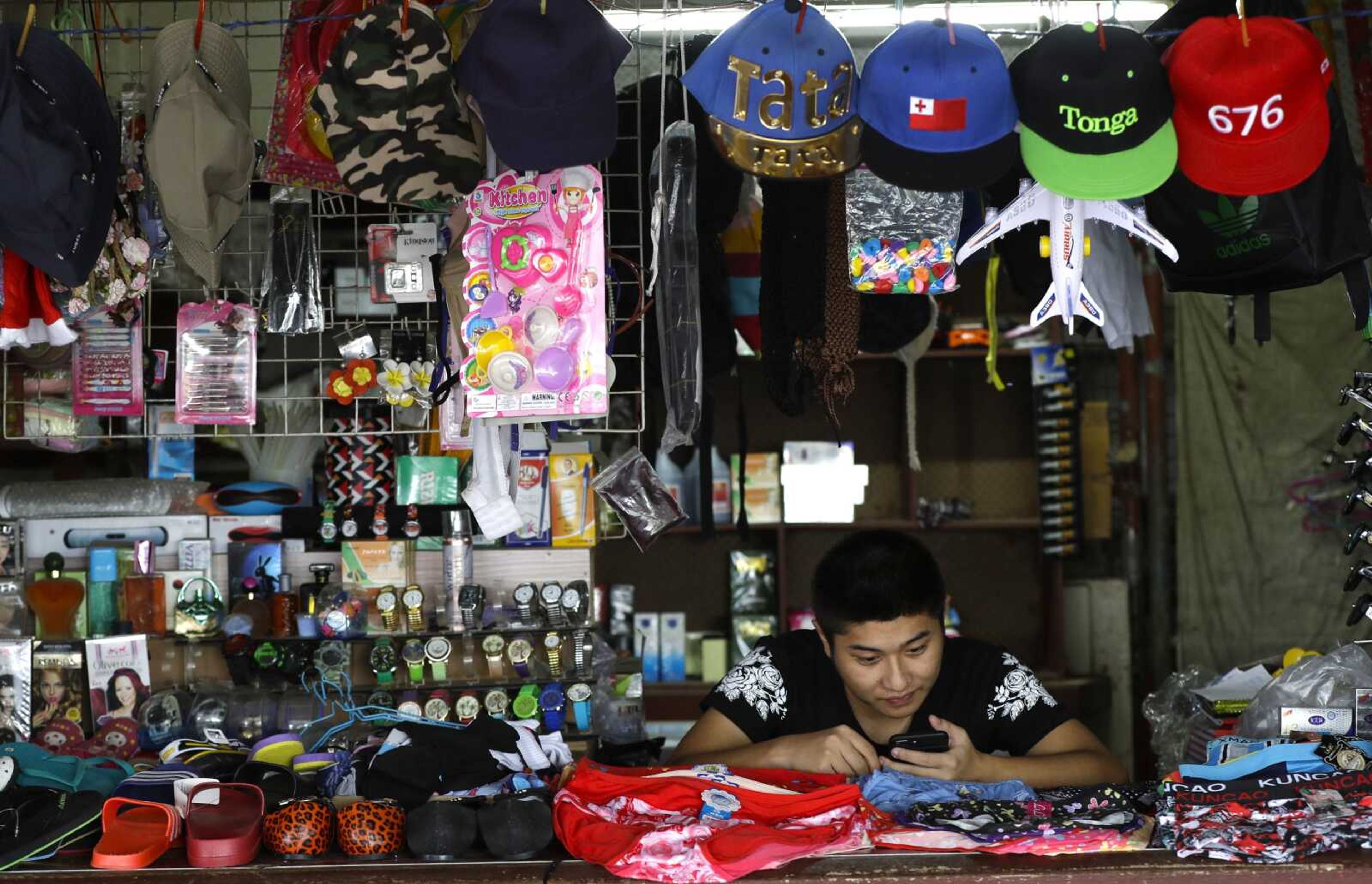 A shopkeeper waits for business in Nuku'alofa, Tonga.