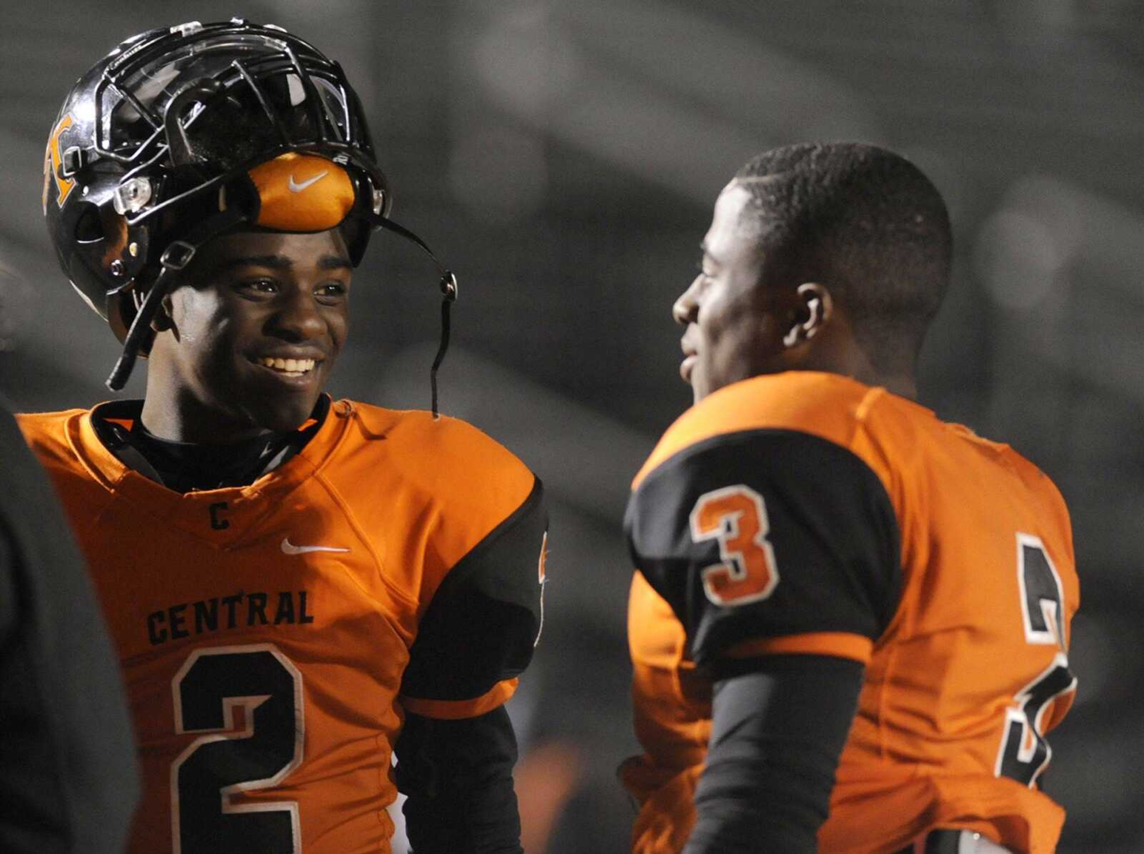 Central's Kway'chon Chisom, left, laughs with Jalen Reddin after their win over Hillsboro in the Class 4 District 1 championship Friday, Nov. 7, 2014 at Central. (Glenn Landberg)