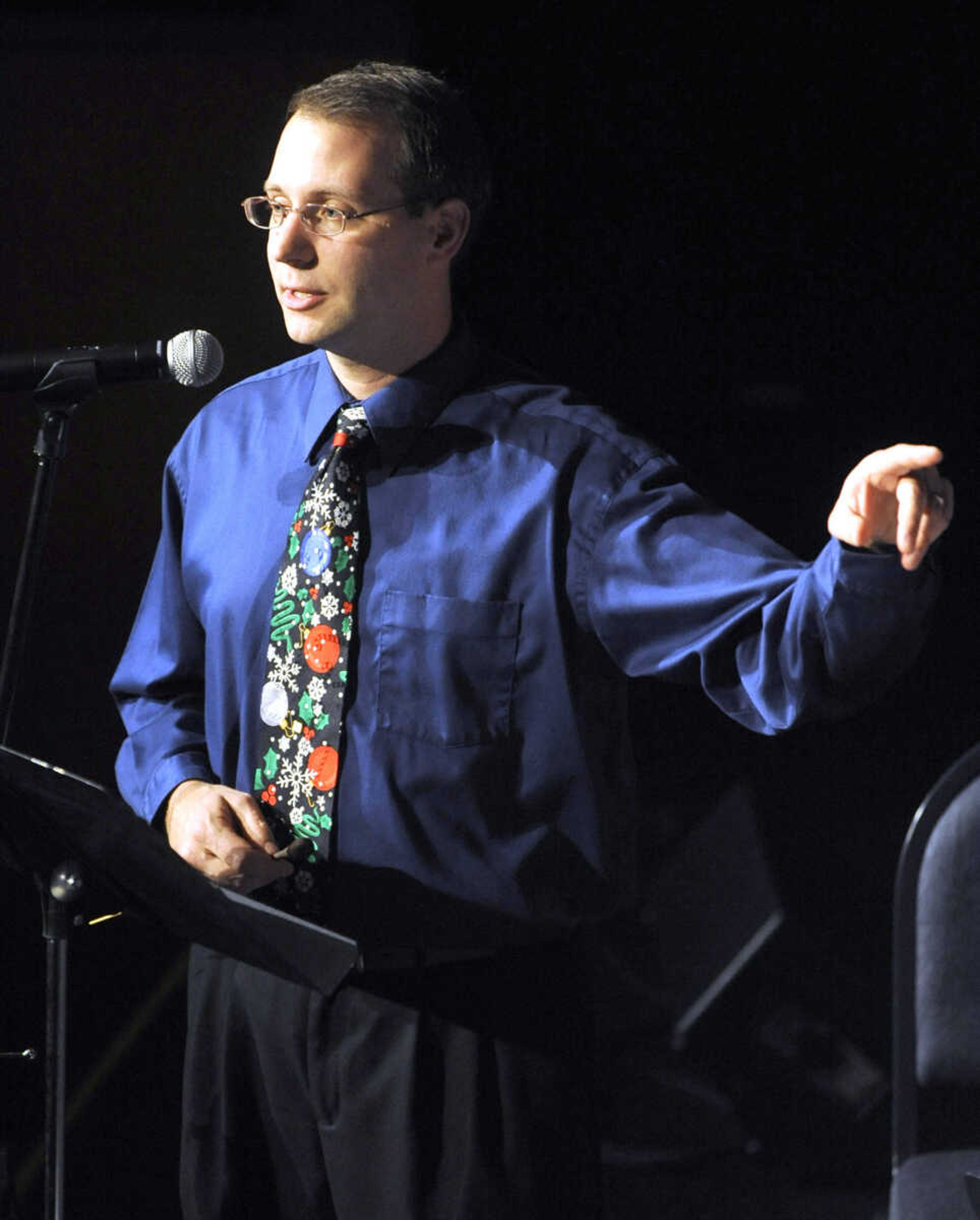 Dr. Shane Mizicko introduces the Steel Drum Band at the Family Holiday Concert Saturday, Dec. 13, 2014 at Bedell Performance Hall on the River Campus.