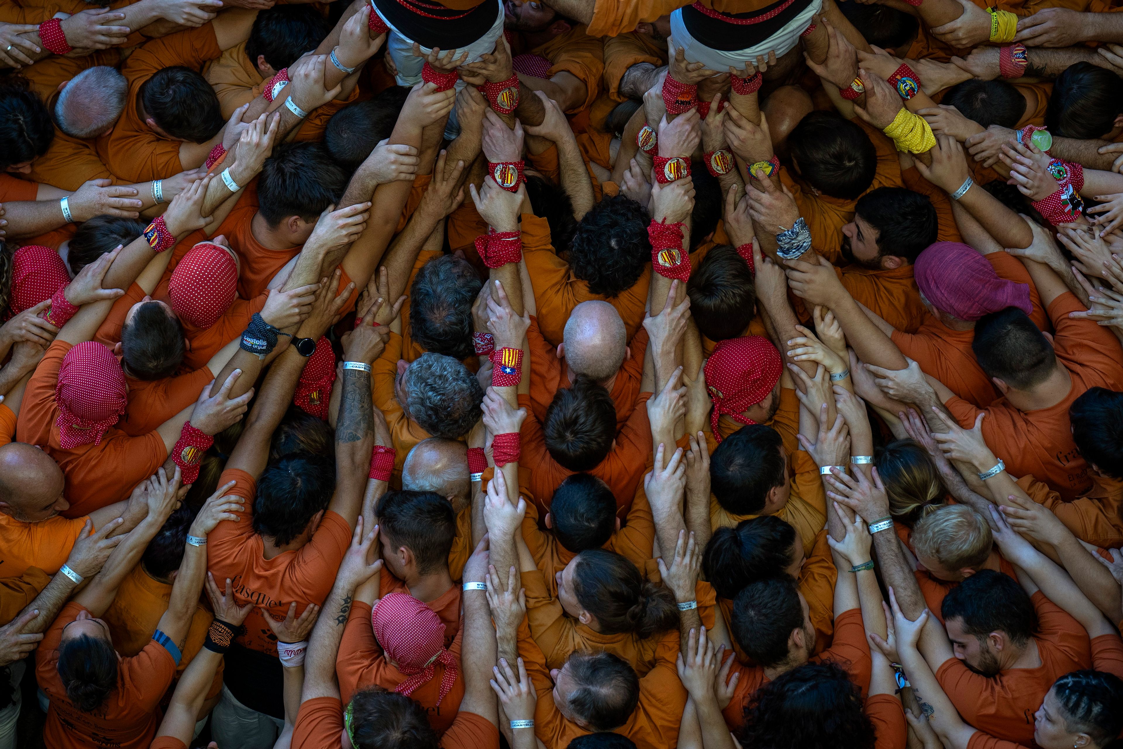 Members of "Sagals d'Osona" form a "Castell" or human tower, during the 29th Human Tower Competition in Tarragona, Spain, Saturday, Oct. 5, 2024. (AP Photo/Emilio Morenatti)