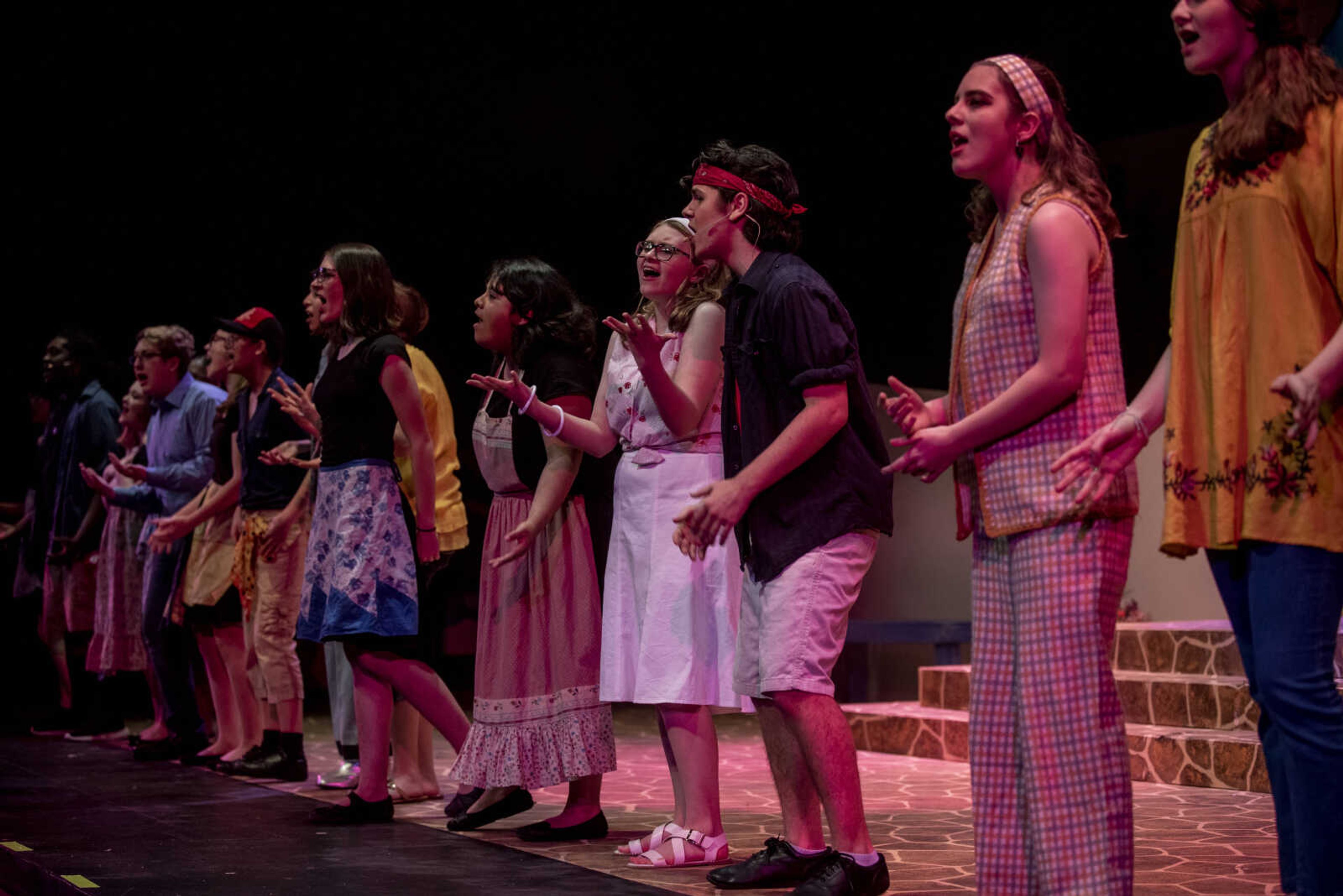 The ensemble performs the song "Mamma Mia" during the media night of Cape Central High School's spring musical production of "Mamma Mia!" Wednesday, April 10, 2019, in Cape Girardeau.