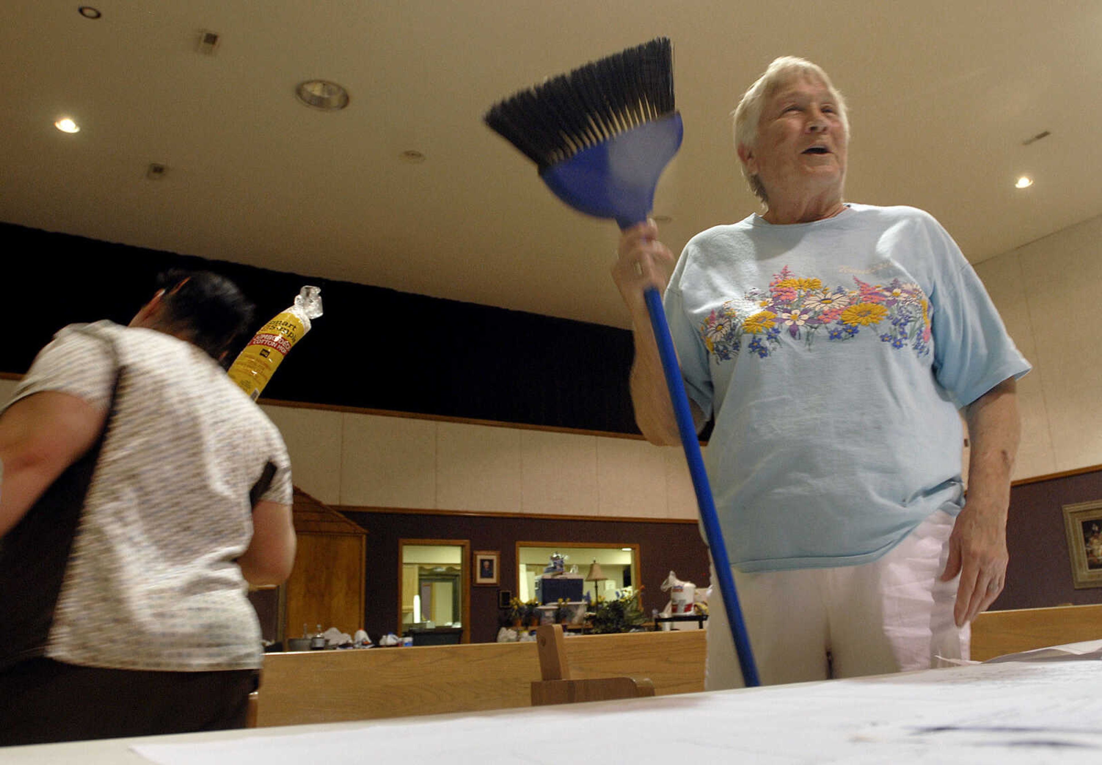 LAURA SIMON~lsimon@semissourian.com
Morehouse resident Lonnie Middleton picks up a broom and cleaning supplies from First General Baptist Church Wednesday, May 11, 2011 in Morehouse.