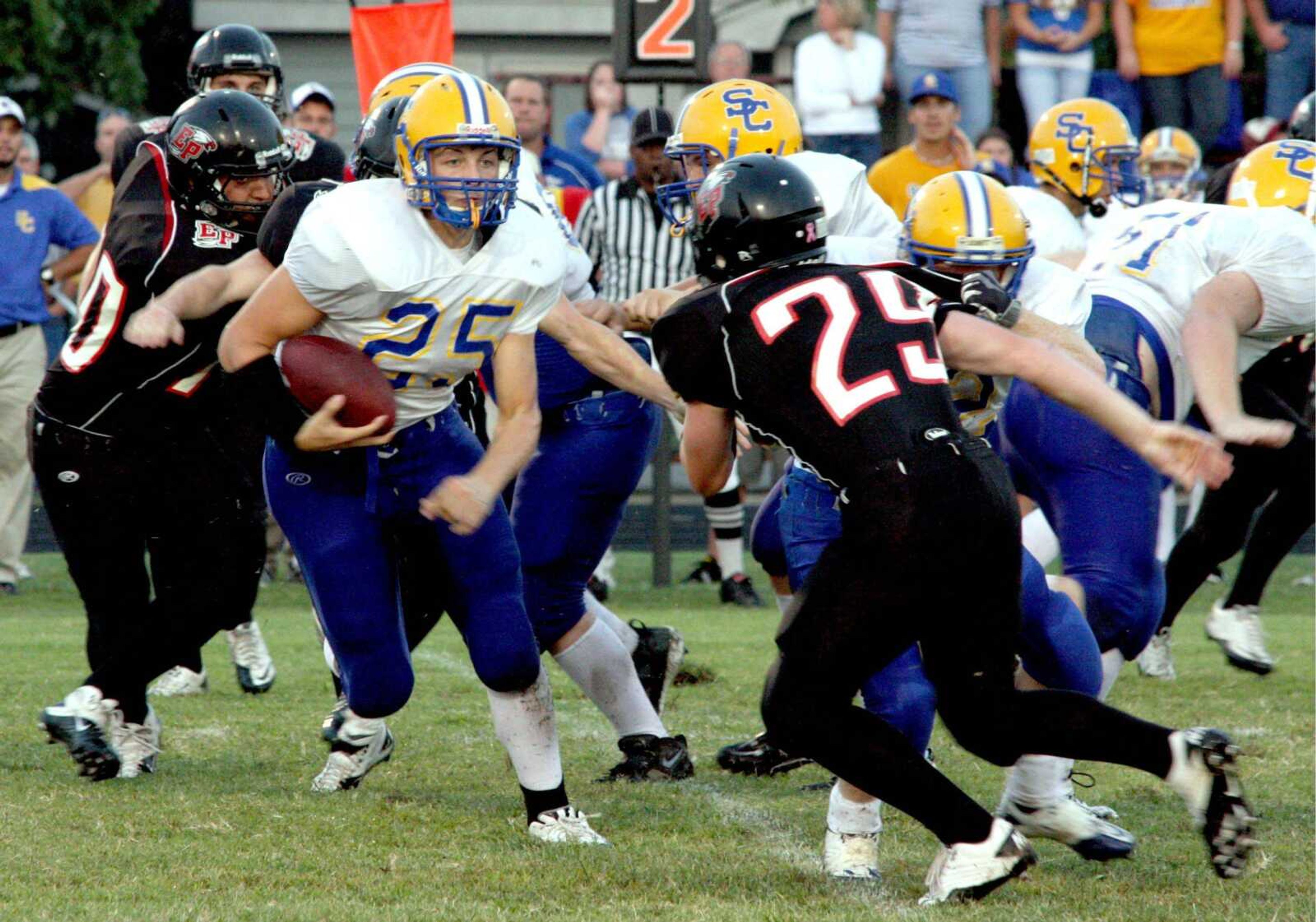 Scott City running back Alex Eichhorn tries to get around East Prairie's Aaron Miller during the first quarter Friday in East Prairie, Mo. (CHRIS POBST ~ Sikeston Standard Democrat)