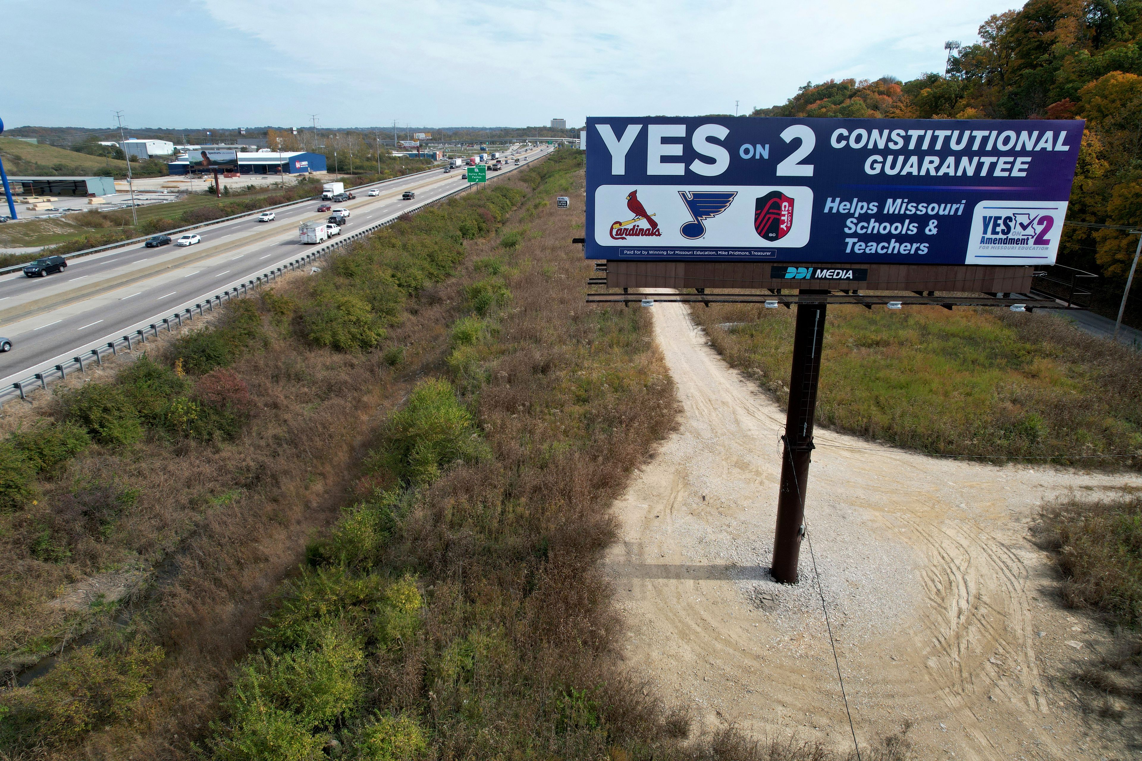 A billboard promoting a ballot measure to legalize sports betting in Missouri is seen along Interstate 44 Wednesday, Oct. 23, 2024, in St. Louis County, Mo. (AP Photo/Jeff Roberson)