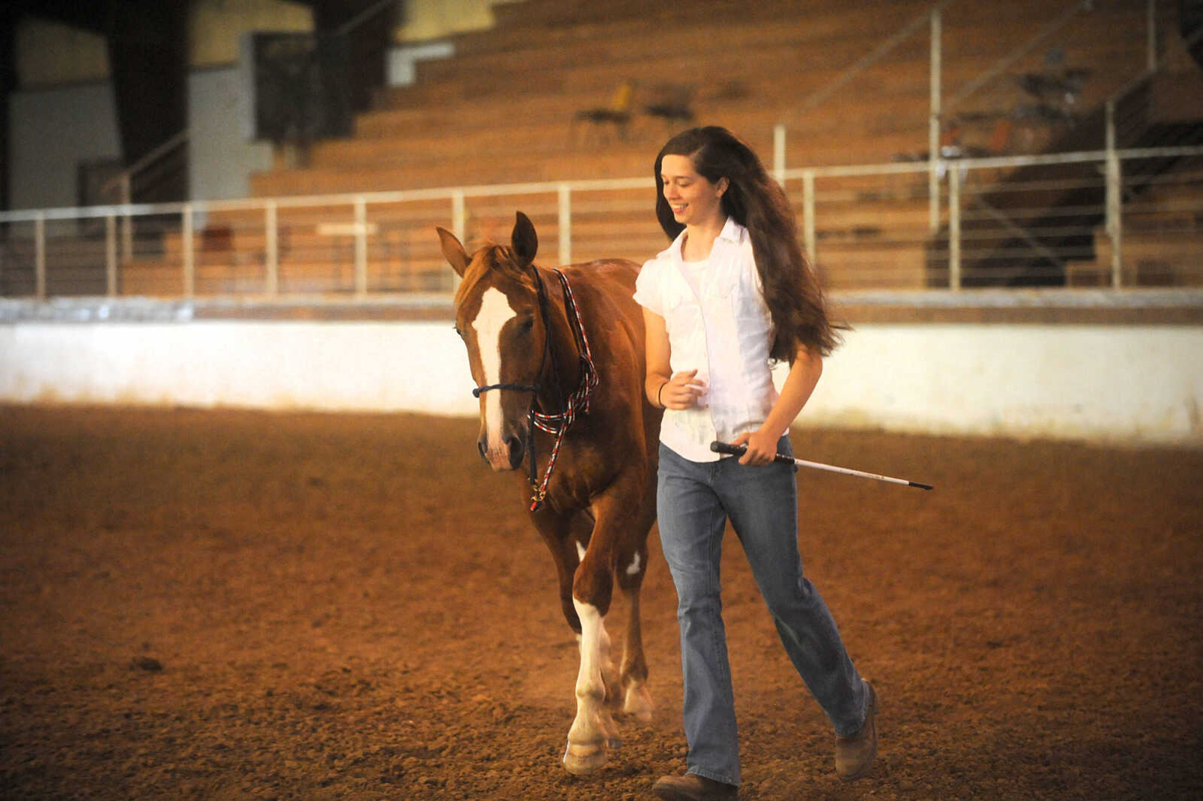 LAURA SIMON ~ lsimon@semissourian.com

Allison Elfrink and her wild mustang, Chico, at Flickerwood Arena in Jackson, Missouri, Wednesday, Aug. 5, 2015.