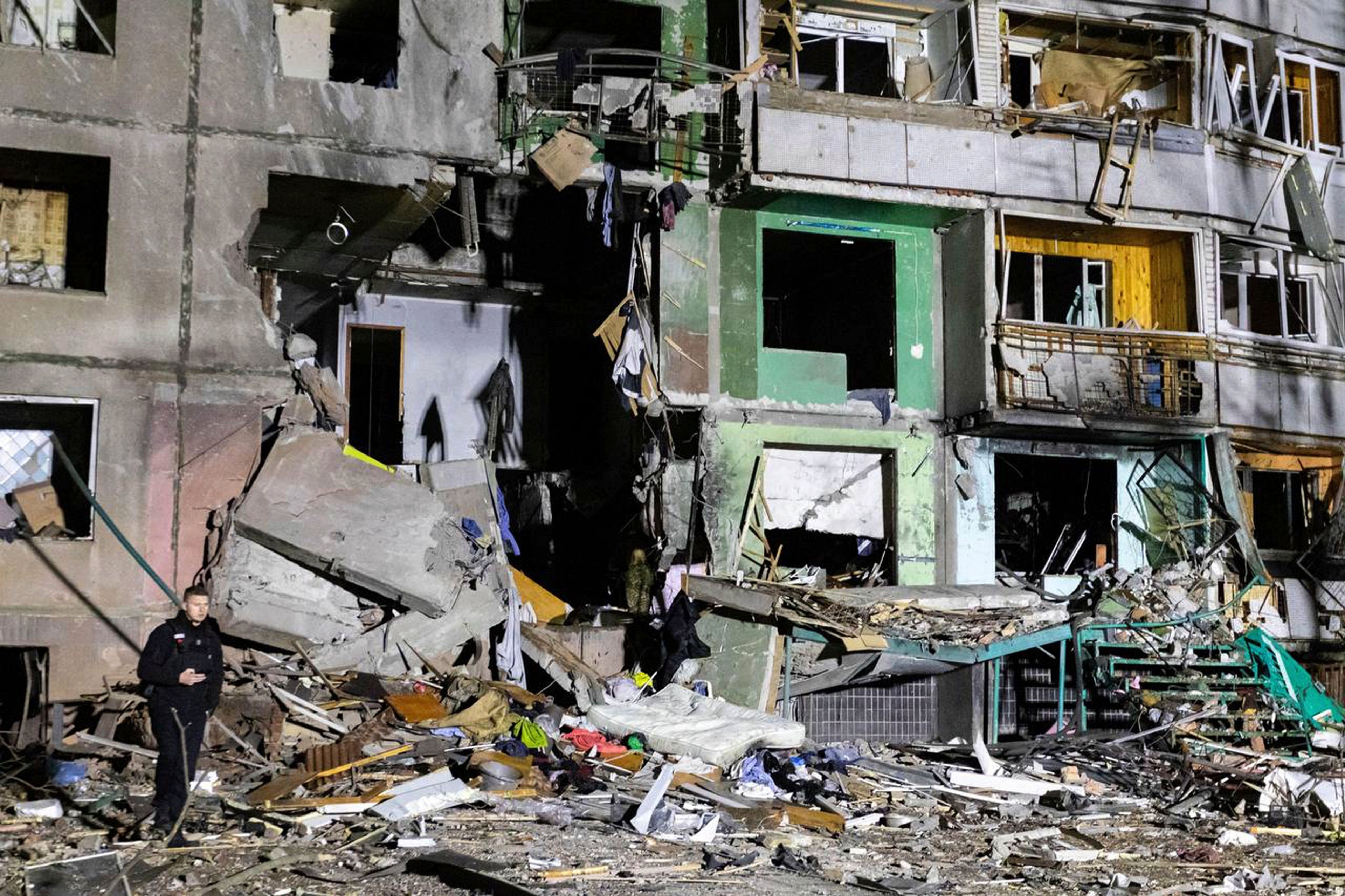 In this photo provided by Kharkiv Regional Administration, an apartment building is seen damaged by a Russian attack in Kharkiv, Ukraine, early Friday, Nov. 8, 2024. (Kharkiv Regional Administration via AP)