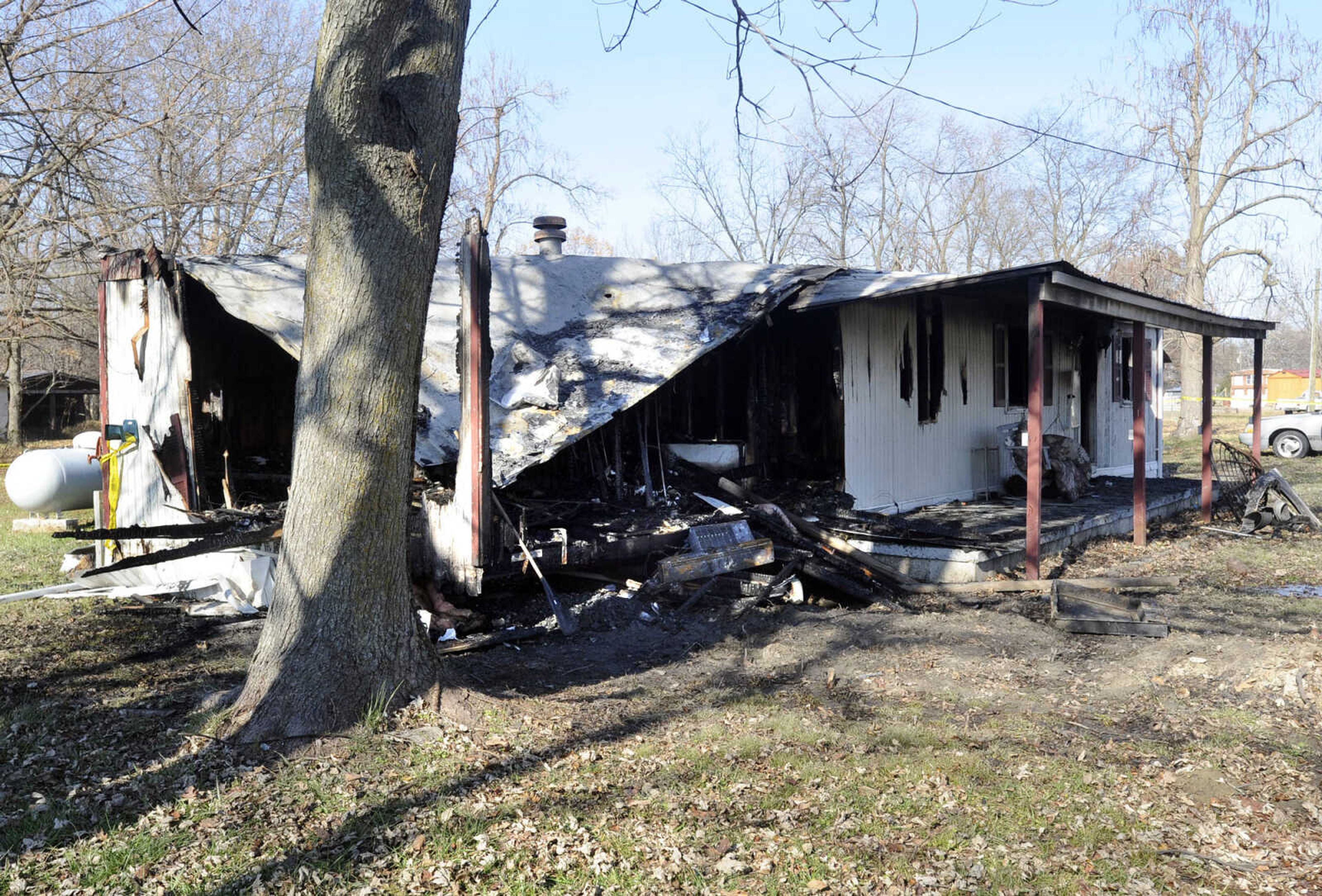 Fire destroyed this mobile home Friday, Nov. 29, 2013 at 466 Penny St. in Allenville. The resident, Angela Schlimme, and her cat, died in the blaze. (Fred Lynch)