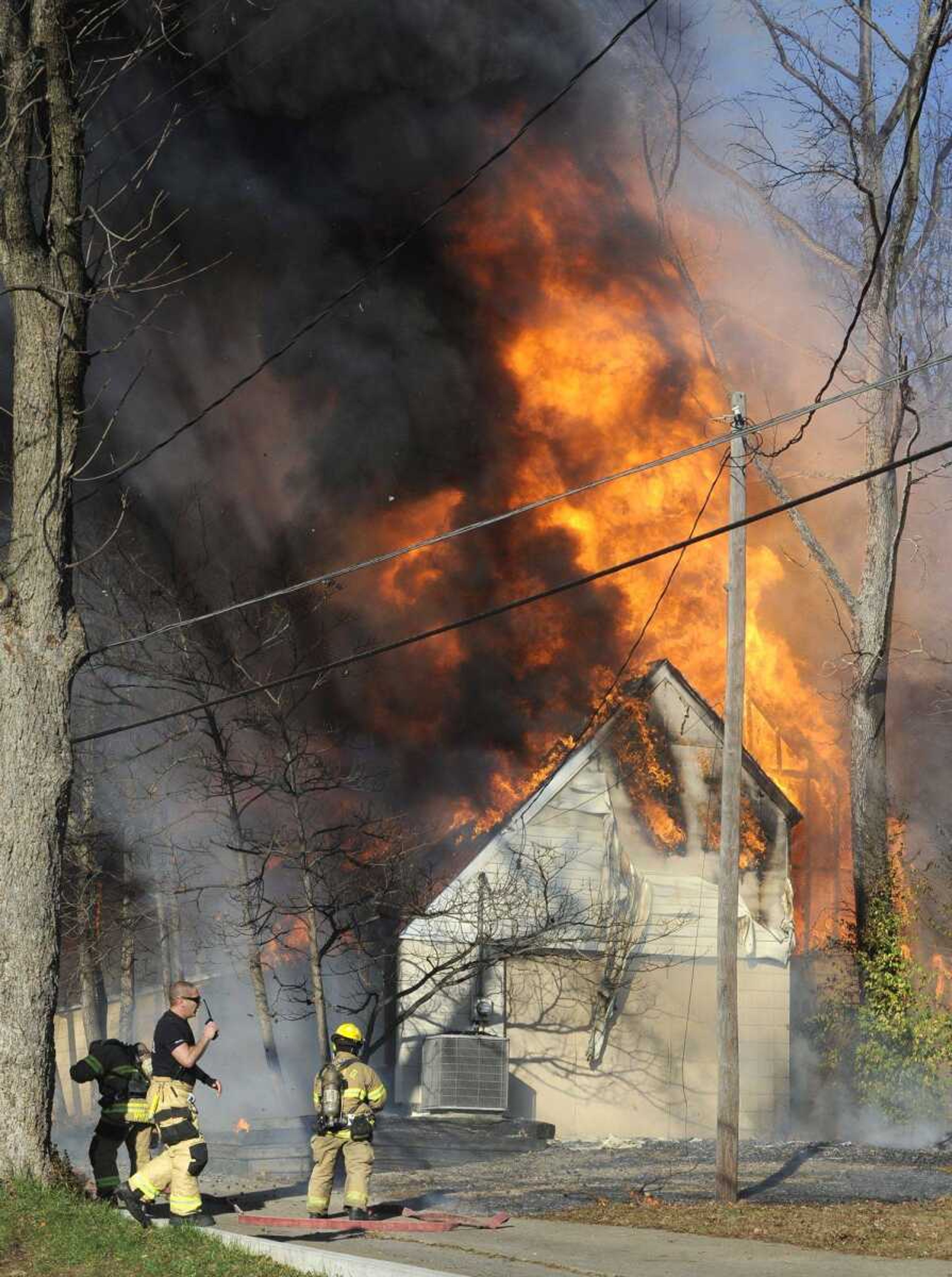 Cape Girardeau firefighters arrive at a fire Sunday afternoon at the banquet hall of Celebrations Restaurant and Bar, 615 Bellevue St. in Cape Girardeau. (Fred Lynch)