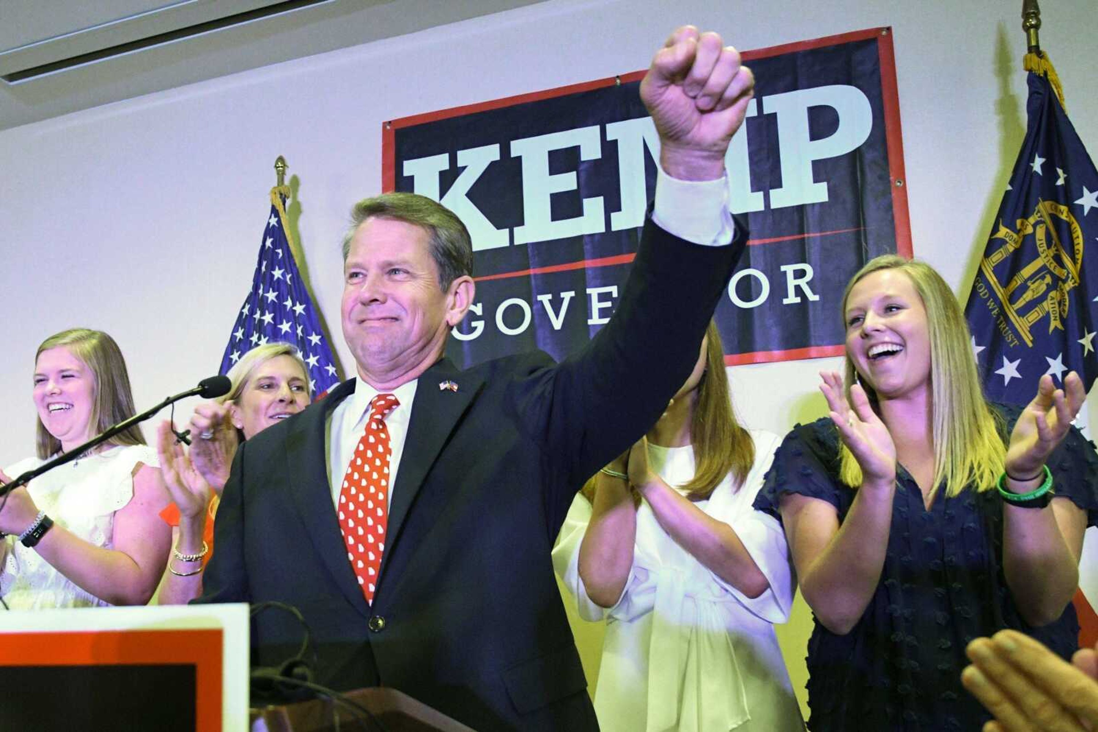 Georgia Republican gubernatorial runoff candidate Brian Kemp goes on stage Tuesday to declare victory against Casey Cagle during an election night party in Athens, Georgia.