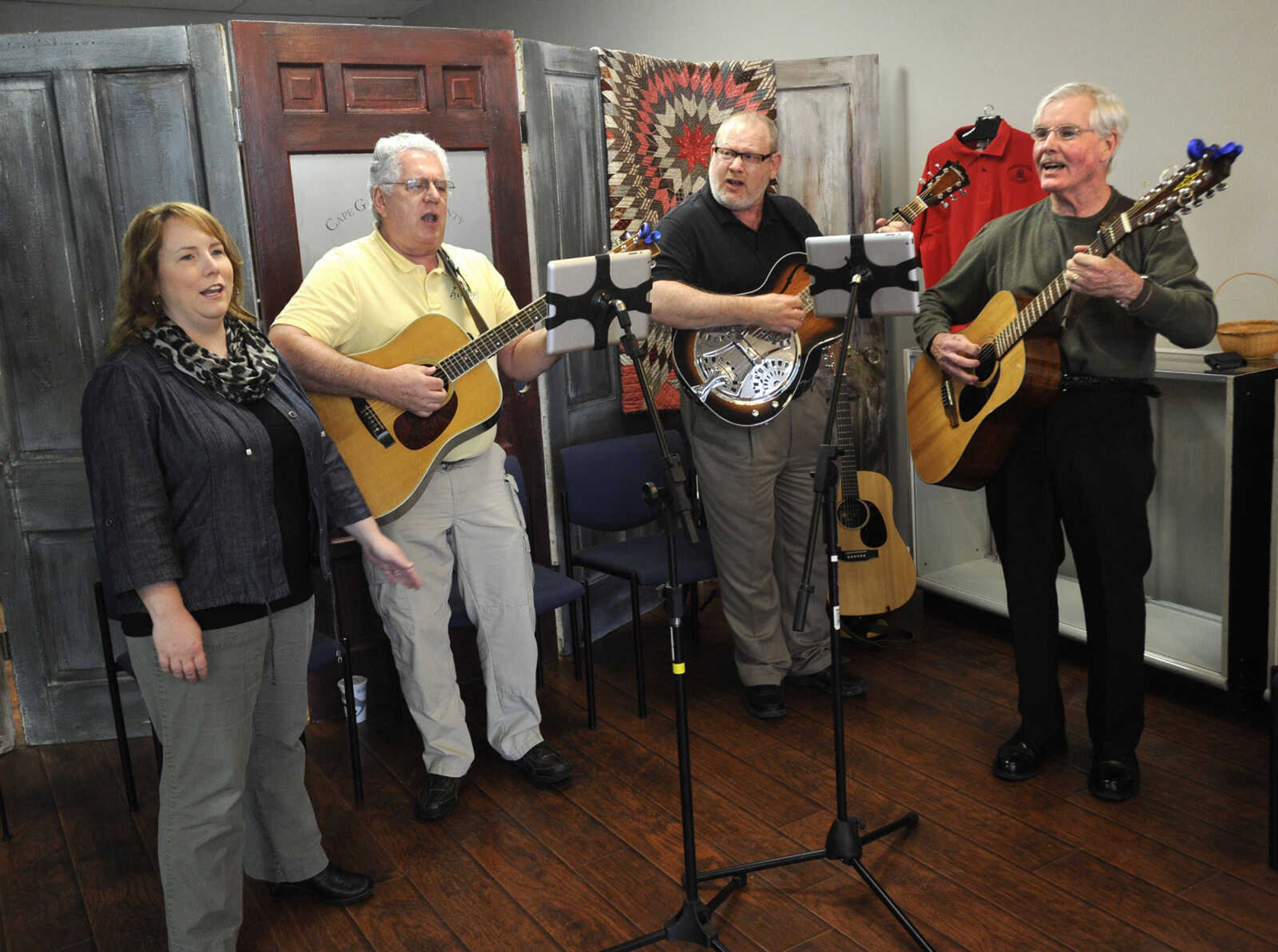 Members of "Barefoot on Sunday," from left, Roanne Dean, Terry Wright, Dr. Steve Jordan and David Giles entertain Sunday, March 15, 2015 at the Cape Girardeau County History Center in Jackson.