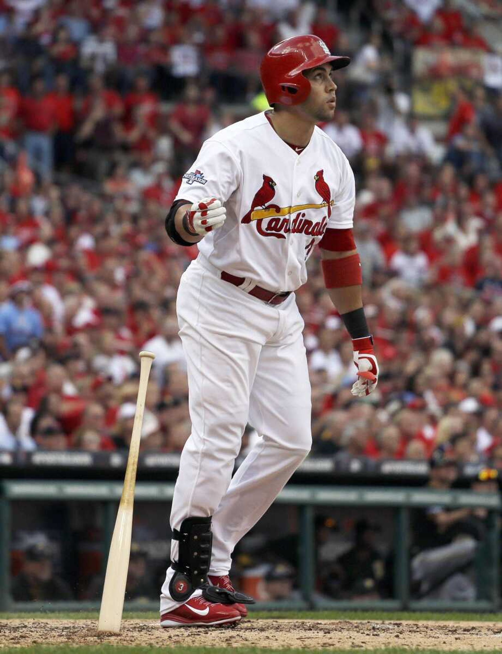 St. Louis Cardinals' Carlos Beltran watches his three-run home run against the Pittsburgh Pirates in the third inning of Game 1 of baseball's National League division series on Thursday, Oct. 3, 2013, in St. Louis. (AP Photo/Jeff Roberson)