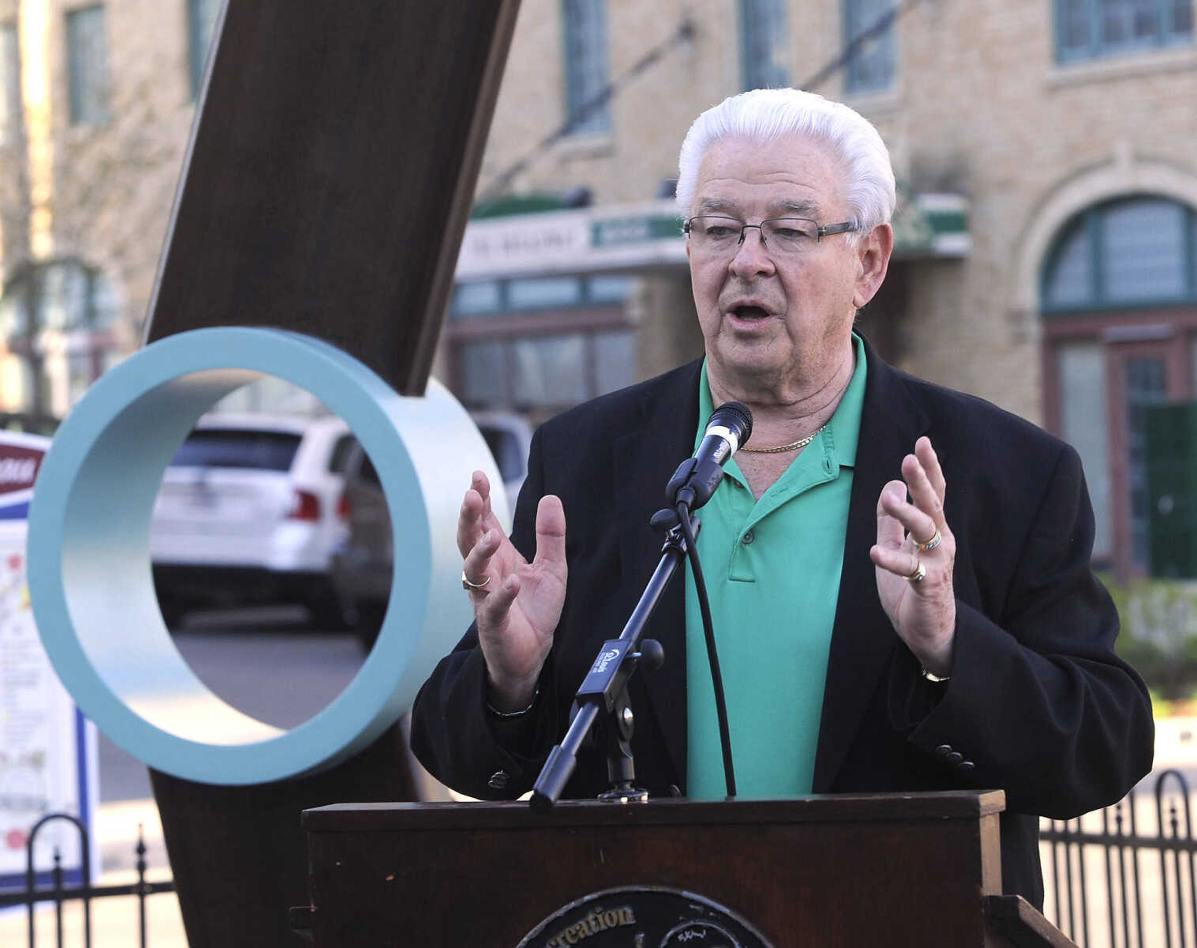 FRED LYNCH ~ flynch@semissourian.com
Mayor Harry Rediger speaks at the opening reception for the Cape Girardeau Outdoor Sculpture Exhibit on Friday, April 15, 2016 at the Vasterling Suites Courtyard in Cape Girardeau.