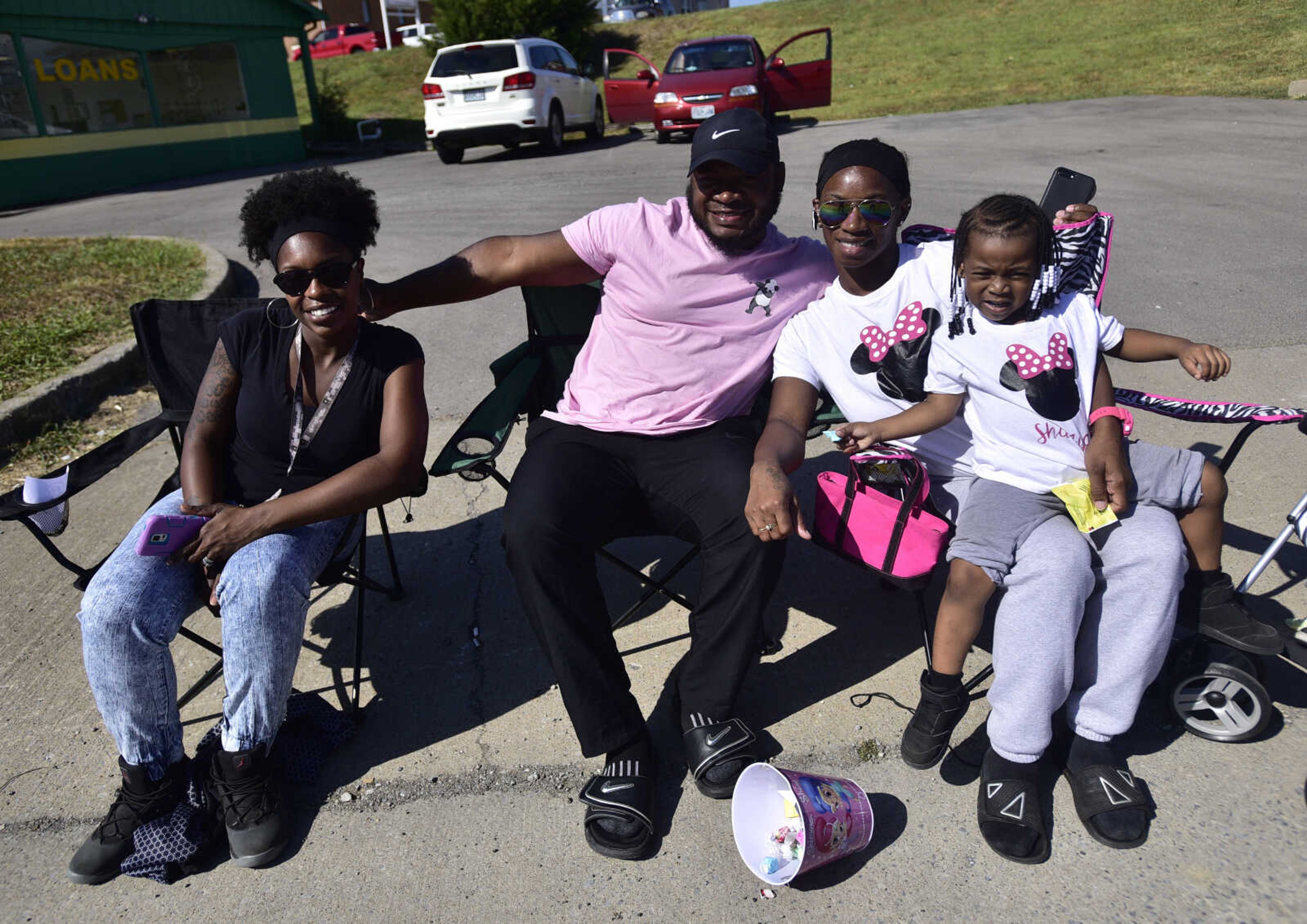 From left, Kaiya Turner, Antron Turner, Mya Turner and Keisha Turner pose for a photo during the SEMO District Fair parade Saturday, Sept. 9, 2017 in Cape Girardeau.