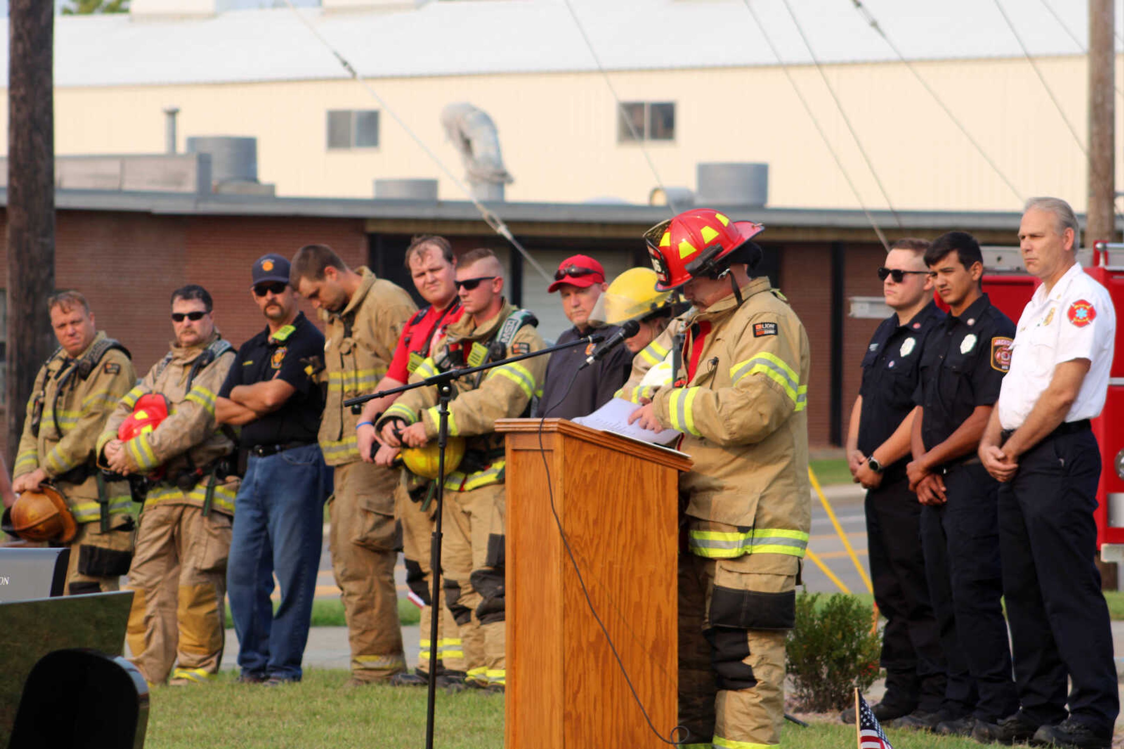 Members of the Jackson Fire Rescue read off the names of all the people who died in the terrorist attacks of Sept. 11, 2001, during the memorial service held at Fire Station 1 in Jackson Saturday, Sept. 11, 2021.&nbsp;