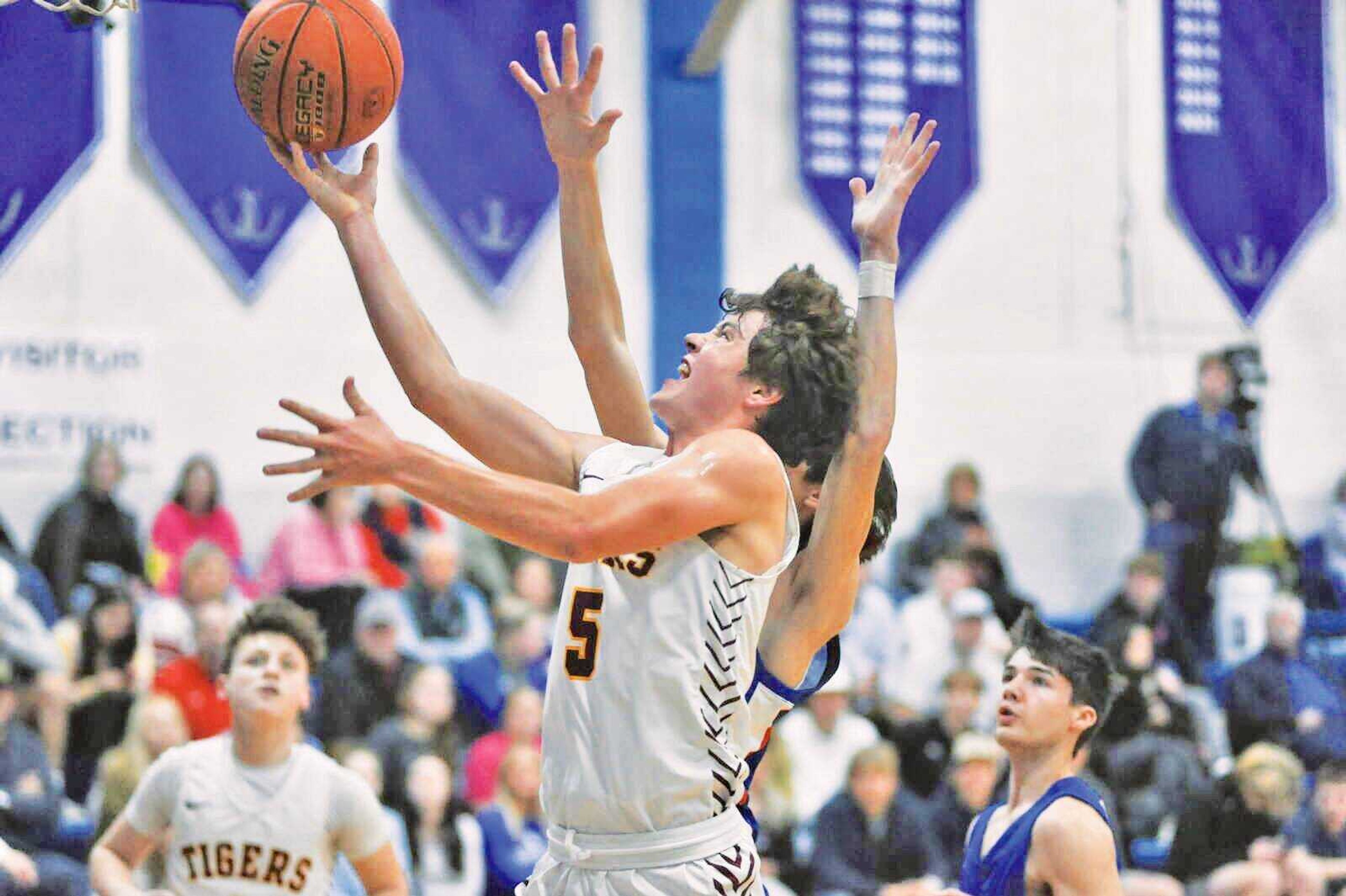 Neelyville�s Drew Shands drives to the rim during the Tigers game against Twin Rivers in the Bernie Invitational Tournament earlier this season