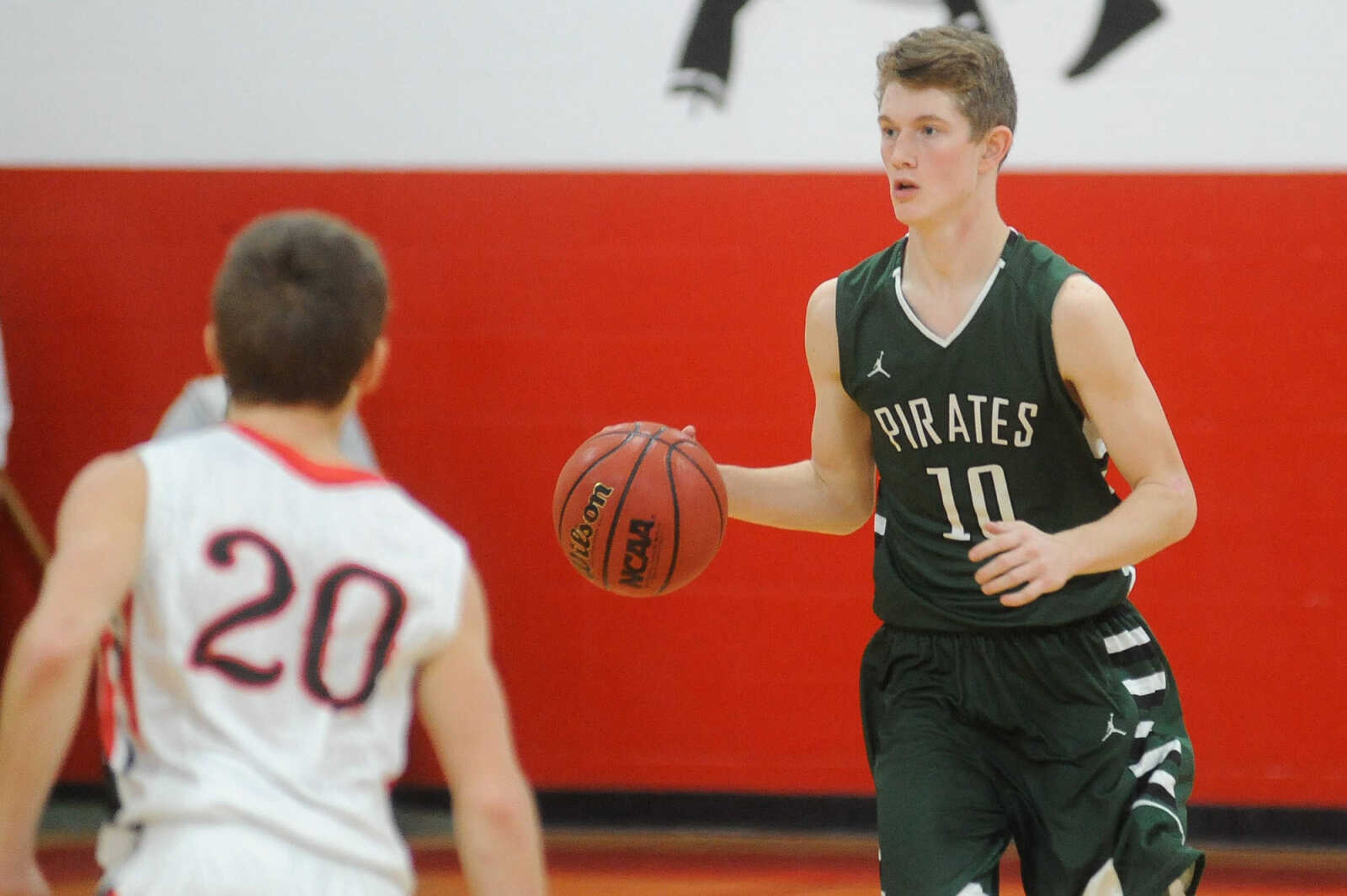 Perryville's Conner Stark works the ball down the court in the first quarter against Woodland in a semifinal game during the Woodland Invitational Tournament Thursday, Dec. 3, 2015. (Glenn Landberg)