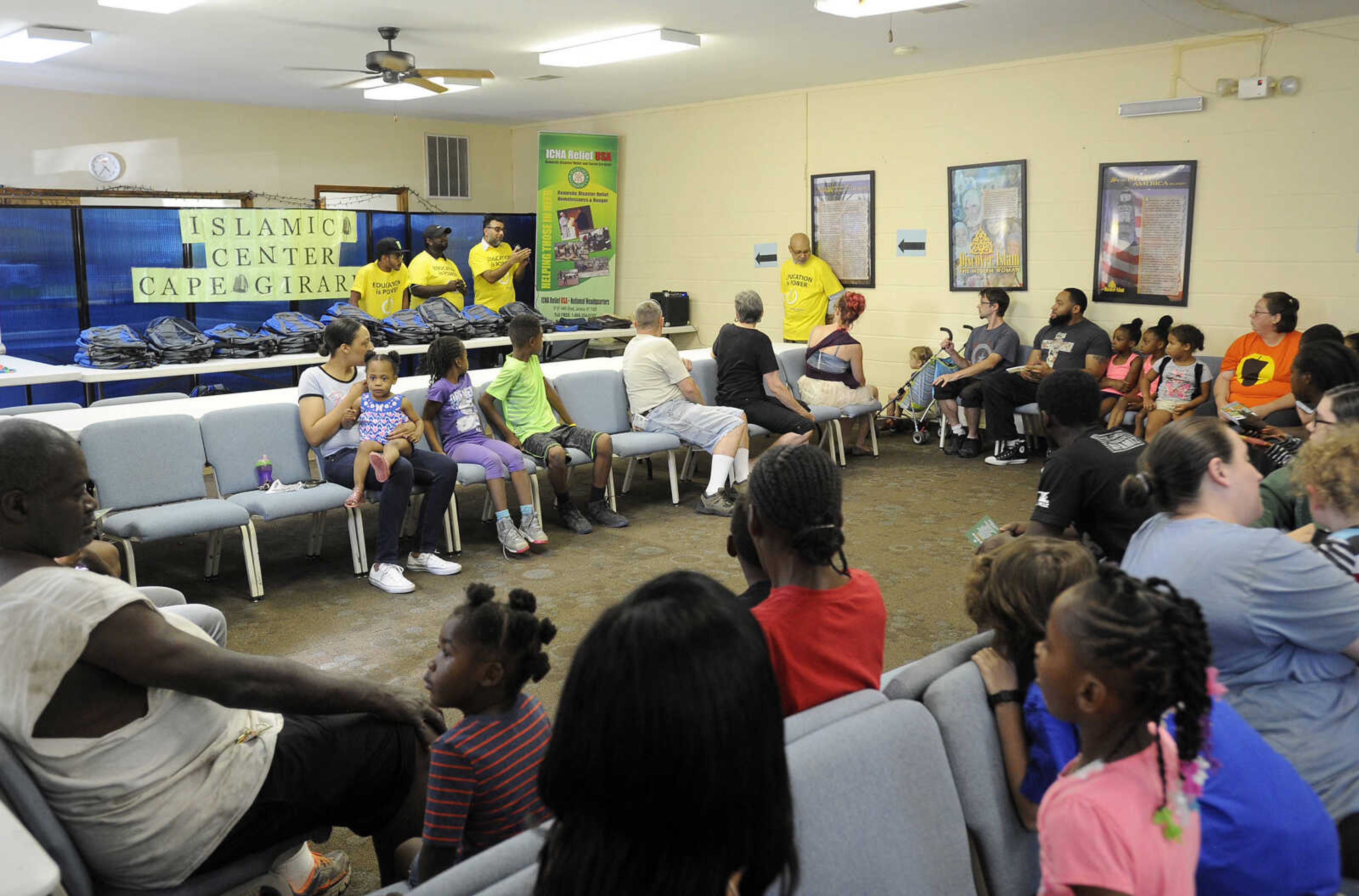 FRED LYNCH ~ flynch@semissourian.com
A group gathers for the next interval backpack distribution Friday, Aug. 4, 2017 at the Islamic Center of Cape Girardeau.