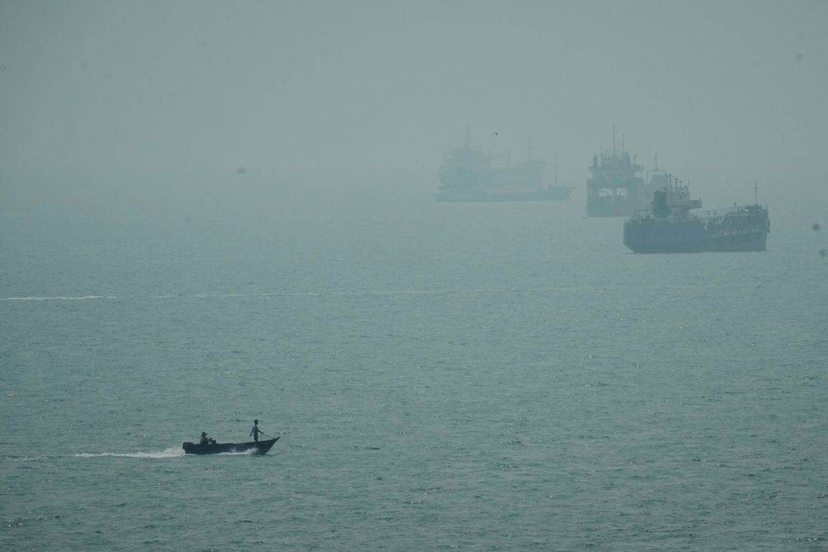 Iranian cargo ship is struck, and talks between Tehran and i...
