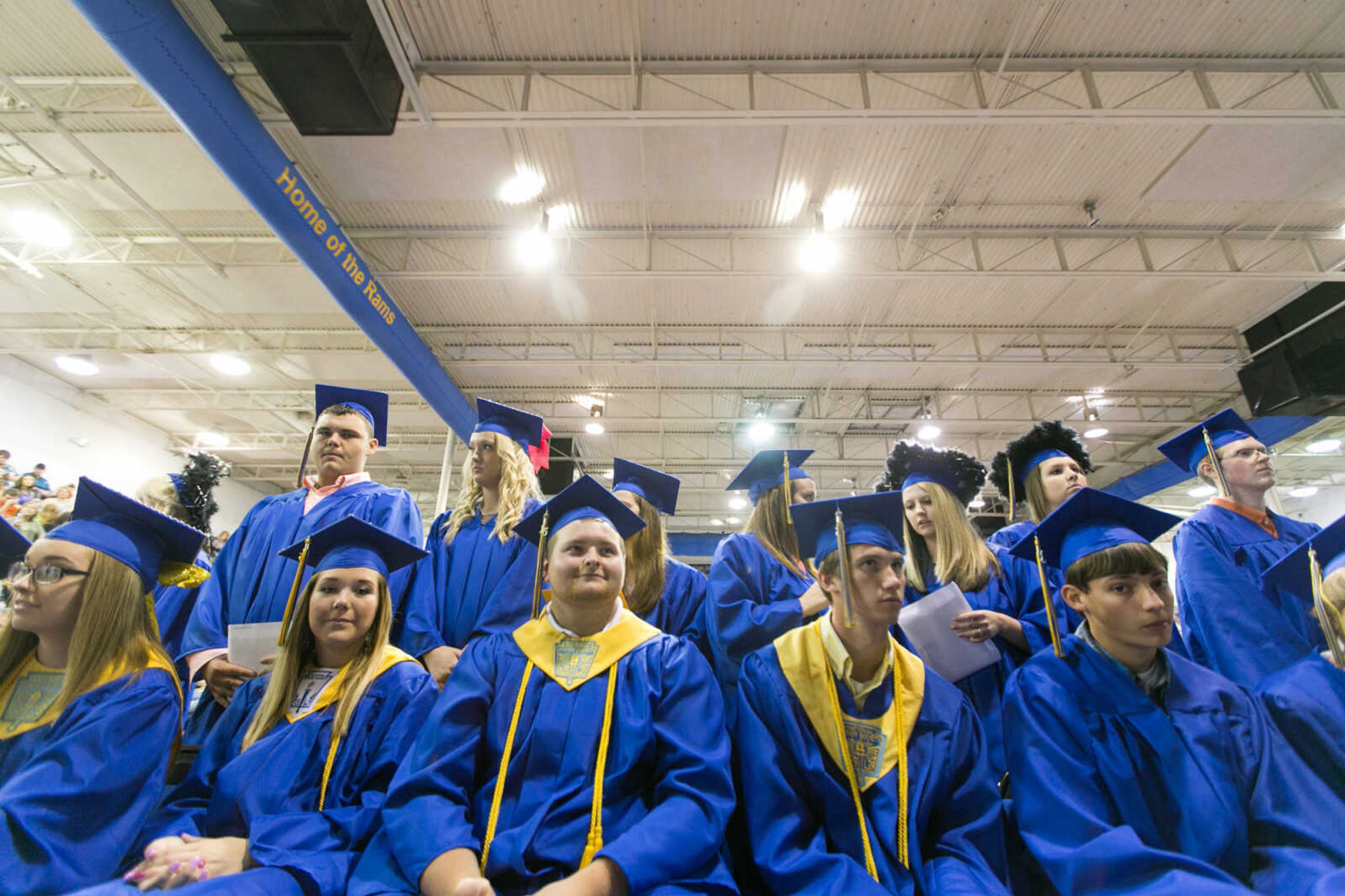 GLENN LANDBERG ~ glandberg@semissourian.com

Seniors line up to receive their diplomas during the Scott City commencement Sunday, May 17, 2015 at Scott City High School.