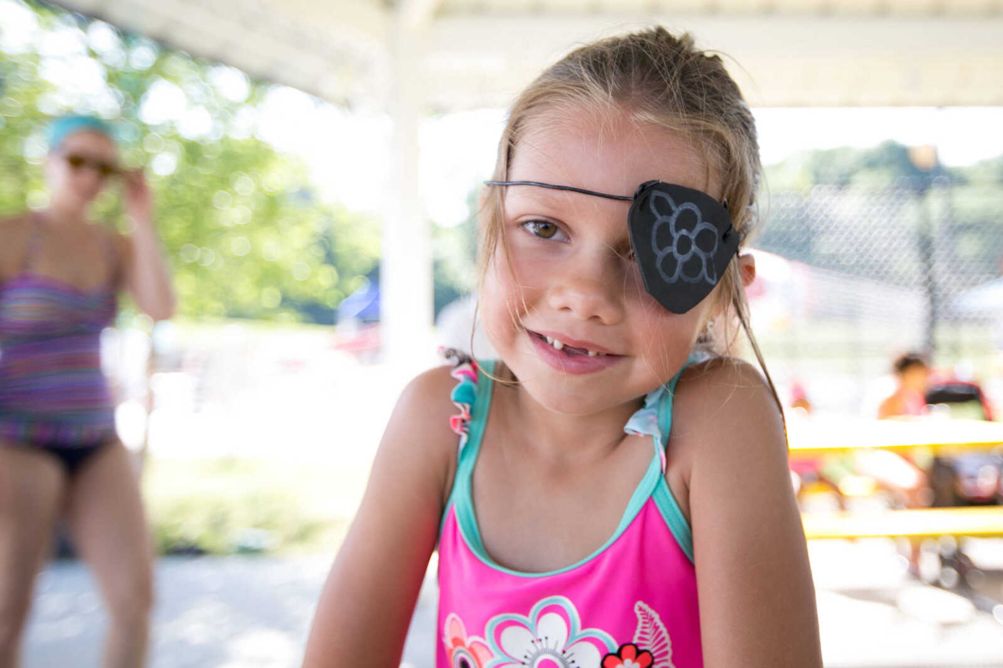 GLENN LANDBERG ~ glandberg@semissourian.com

Alaina Kintner shows off a homemade eye patch during the Mermaid and Pirate Party at Cape Splash Saturday, June 18, 2016 in Cape Girardeau.