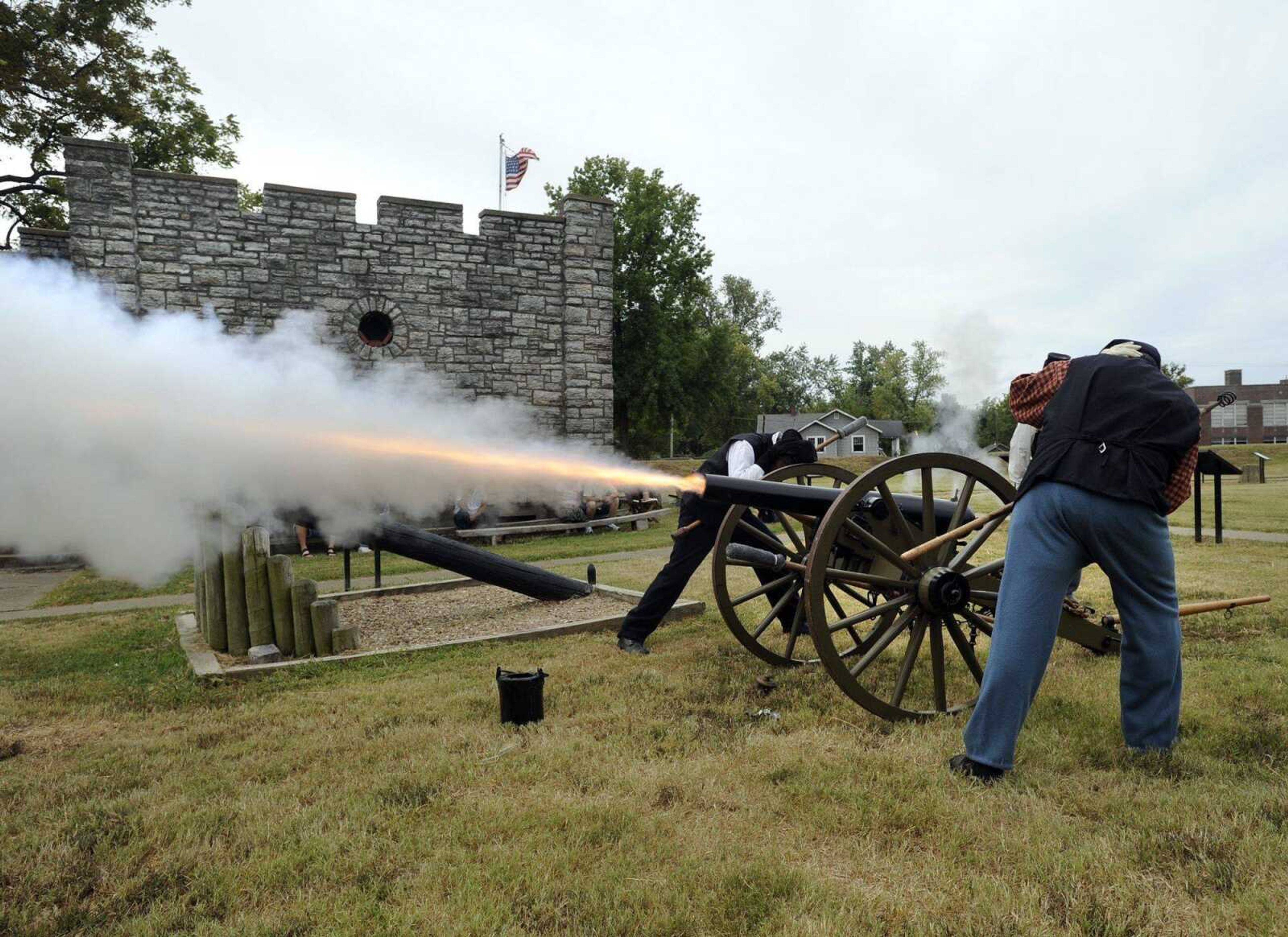 Turner Brigade members fire the cannon Monday at Fort D in Cape Girardeau. (Fred Lynch)