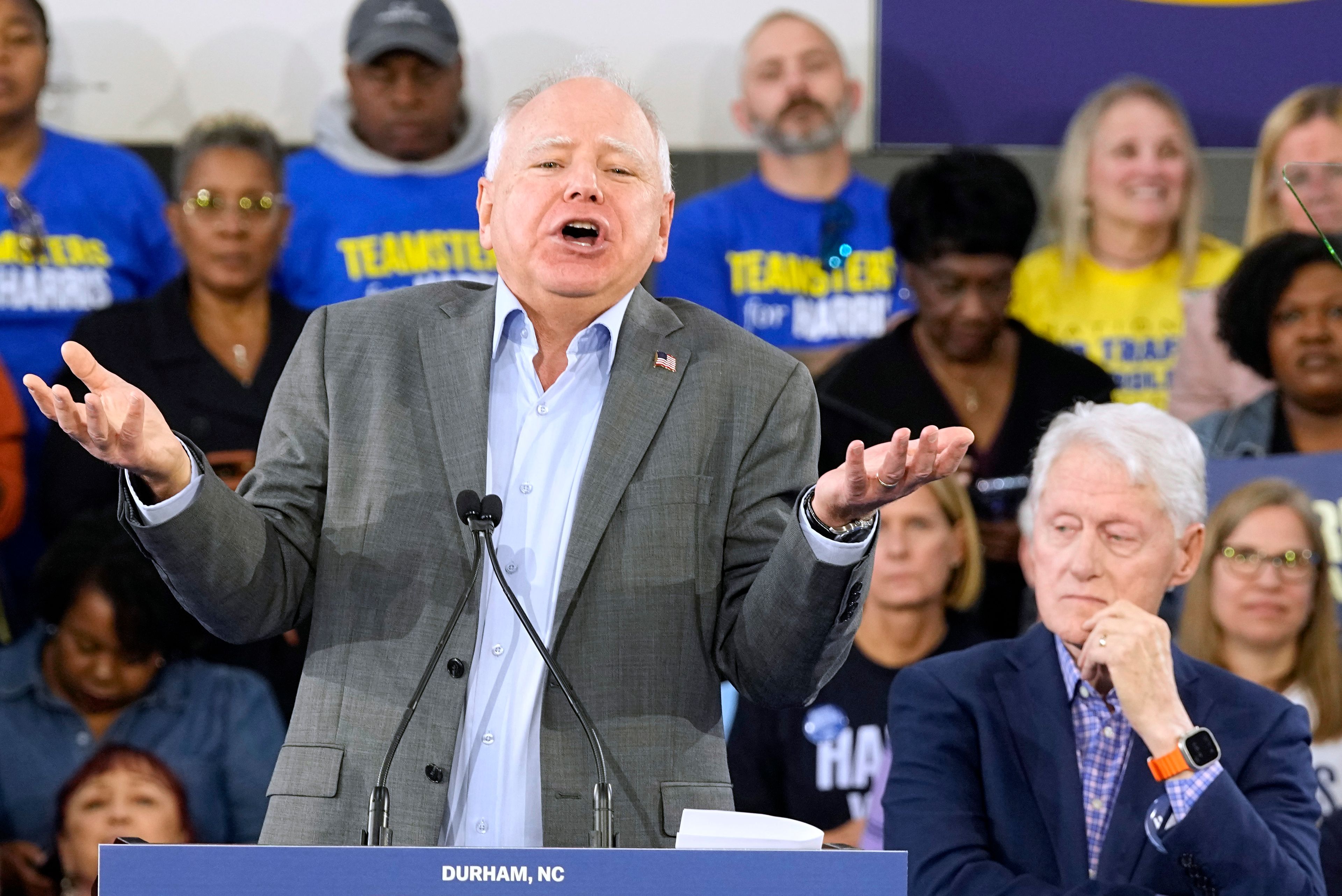 Democratic vice presidential nominee Minnesota Gov. Tim Walz appears with former President Bill Clinton at a campaign rally in Durham, N.C., Thursday, Oct. 17, 2024. (AP Photo/Steve Helber)