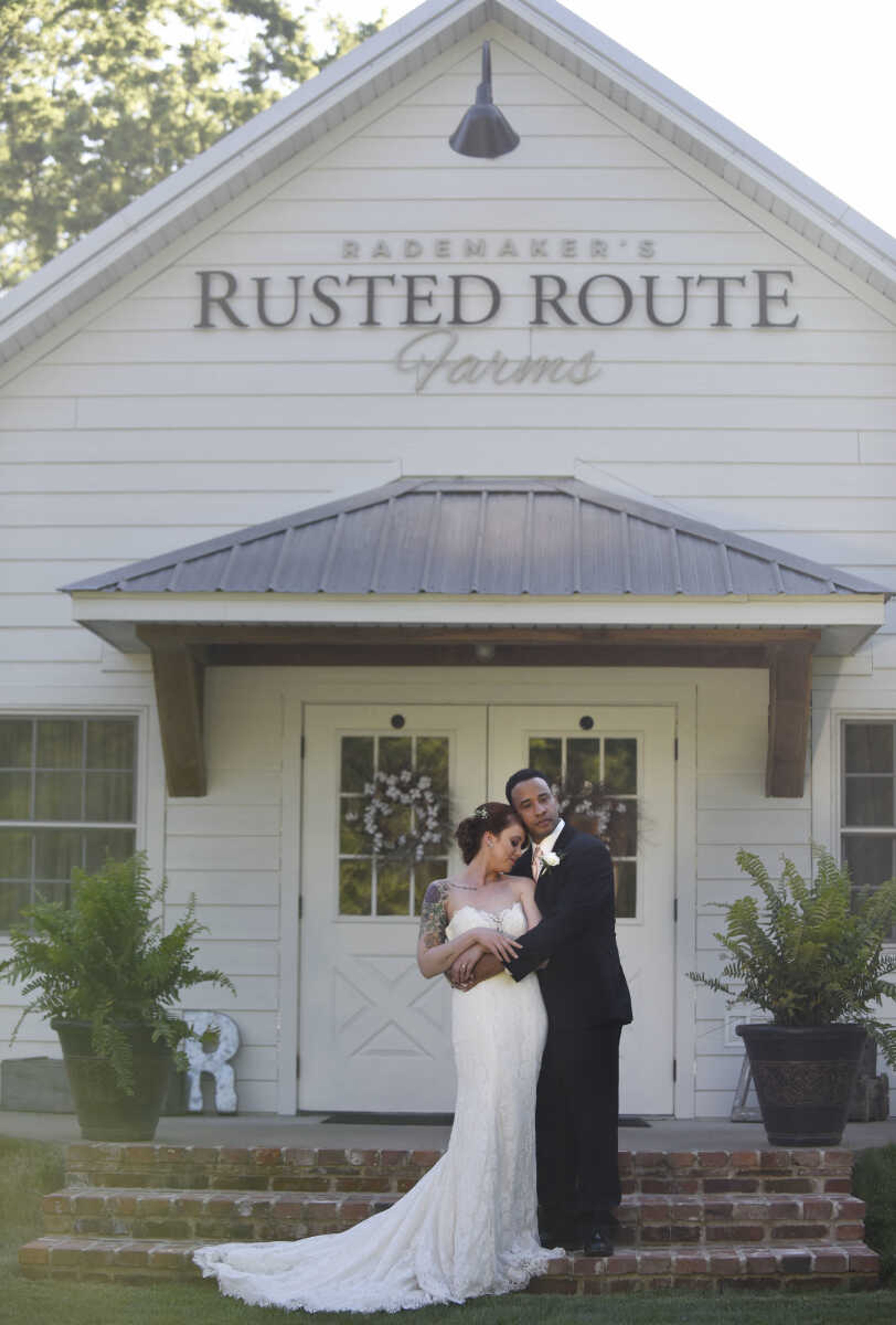 Alvina Valenta: Style 9656 
Ivory lace trumpet bridal gown with a strapless neckline and sheer lace back. Available at Magnolias Bridal Boutique in Cape Girardeau.

Earrings: Lindsay Marie Design : Style "Magnolia"


Wedding suits courtesy of Jim's Formal Wear and available at Garber's Men's Wear in Cape Girardeau.