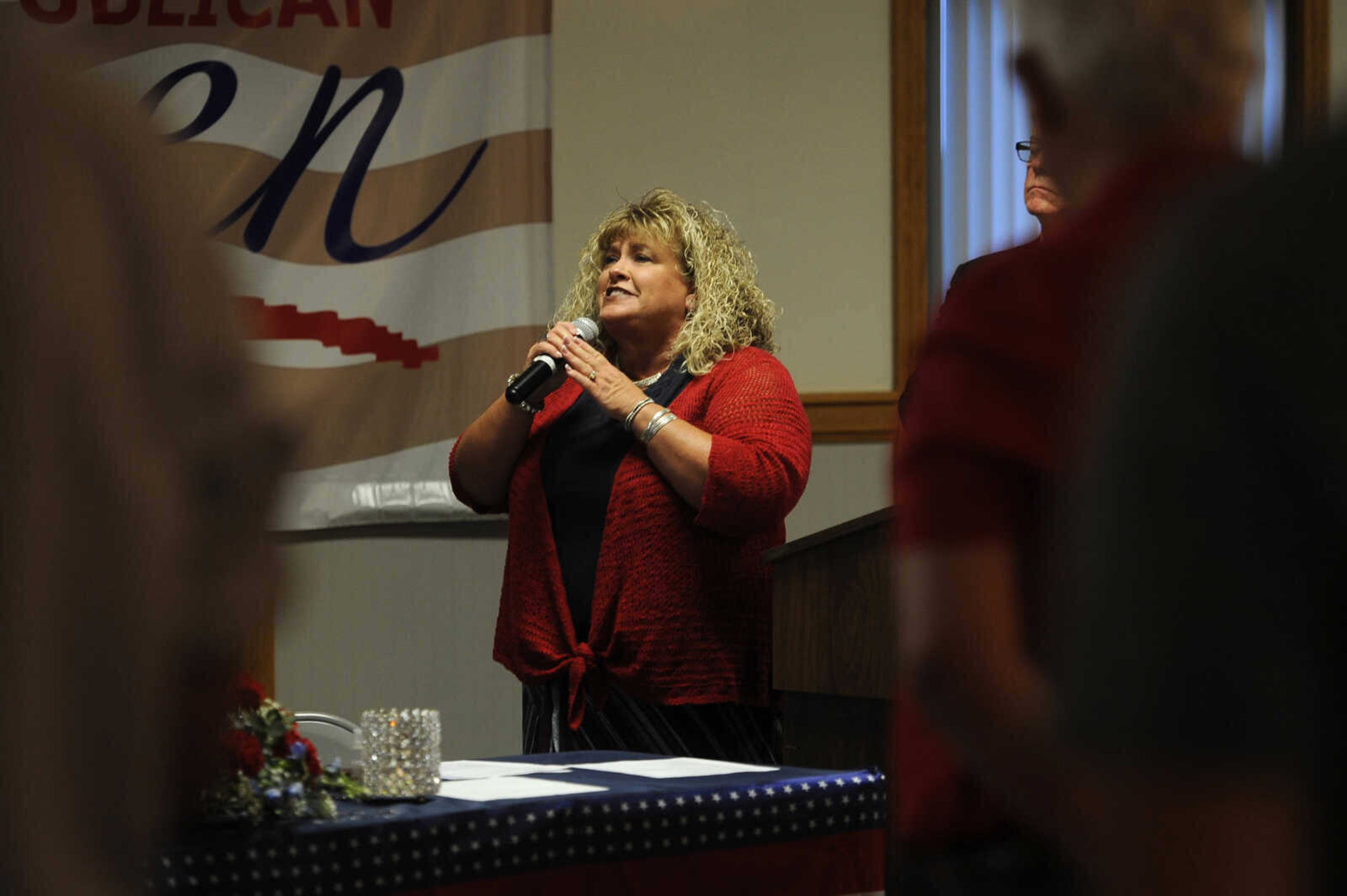 Cape Girardeau County Republican Women's Club president Lisa Reitzel sings the national anthem at the Cape Girardeau County Republican Women's Club 2021 Lincoln Day event. 