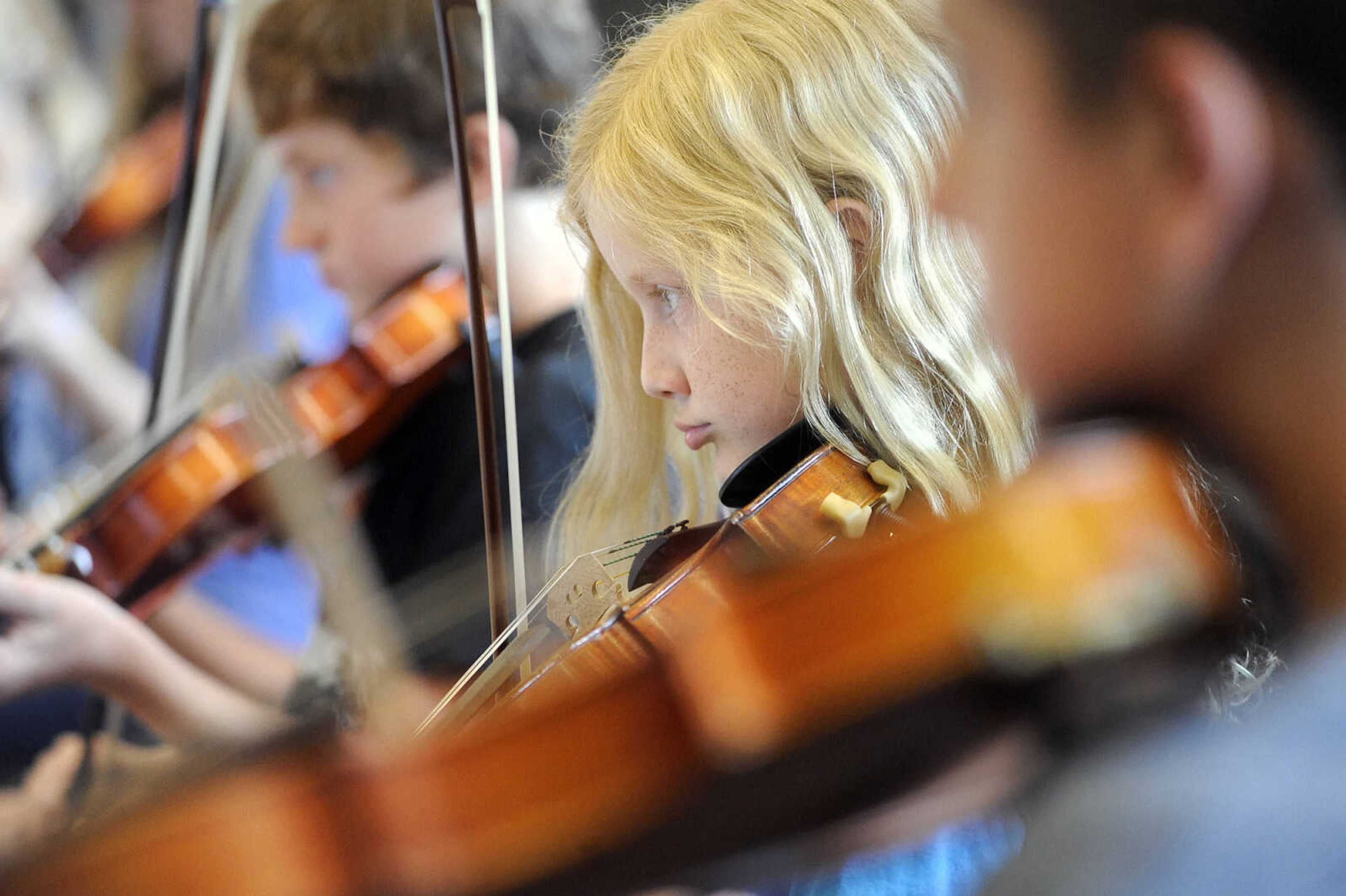 LAURA SIMON ~ lsimon@semissourian.com

Anna Ahrens plays her fiddle along with the other seven students in the Southeast Missouri State University Music Academy's Exploring American Fiddle Styles class taught by Steve Schaffner at the River Campus on Wednesday, July 20, 2016. Most of the students have been playing for 2-3 years and are in the Academy's Suzuki Program. The students will perform on Friday at Ratliff Care Center in Cape Girardeau.