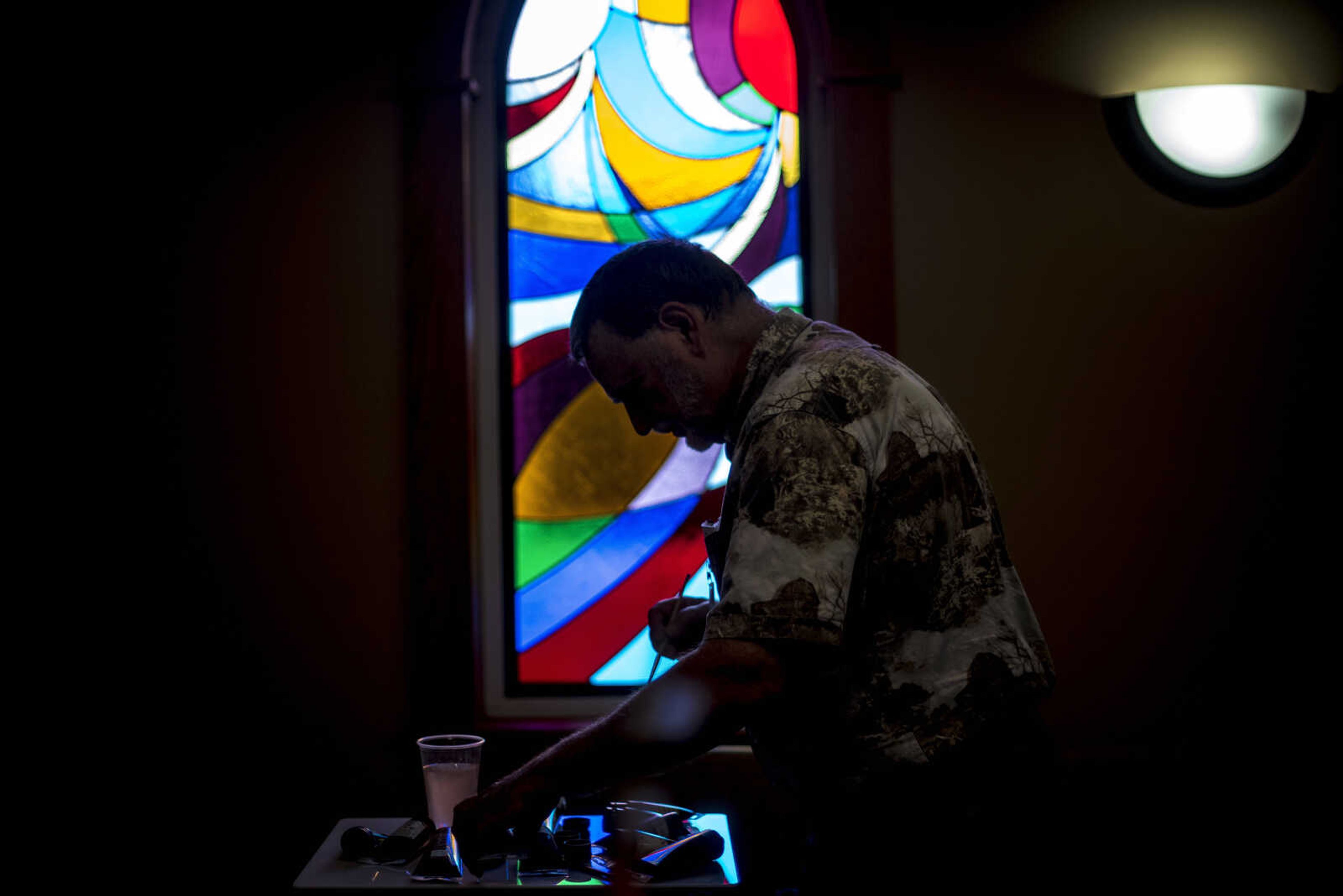 Aaron Horrell prepares his brushes for Paint-For-A-Cause where the residents of the Missouri Veterans Home will be given the opportunity to paint first on the big image Friday, July 28, 2017 in Cape Girardeau. Aaron Horrell will then take the painting to the SEMO District Fair where people can also help paint to raise money for the home.